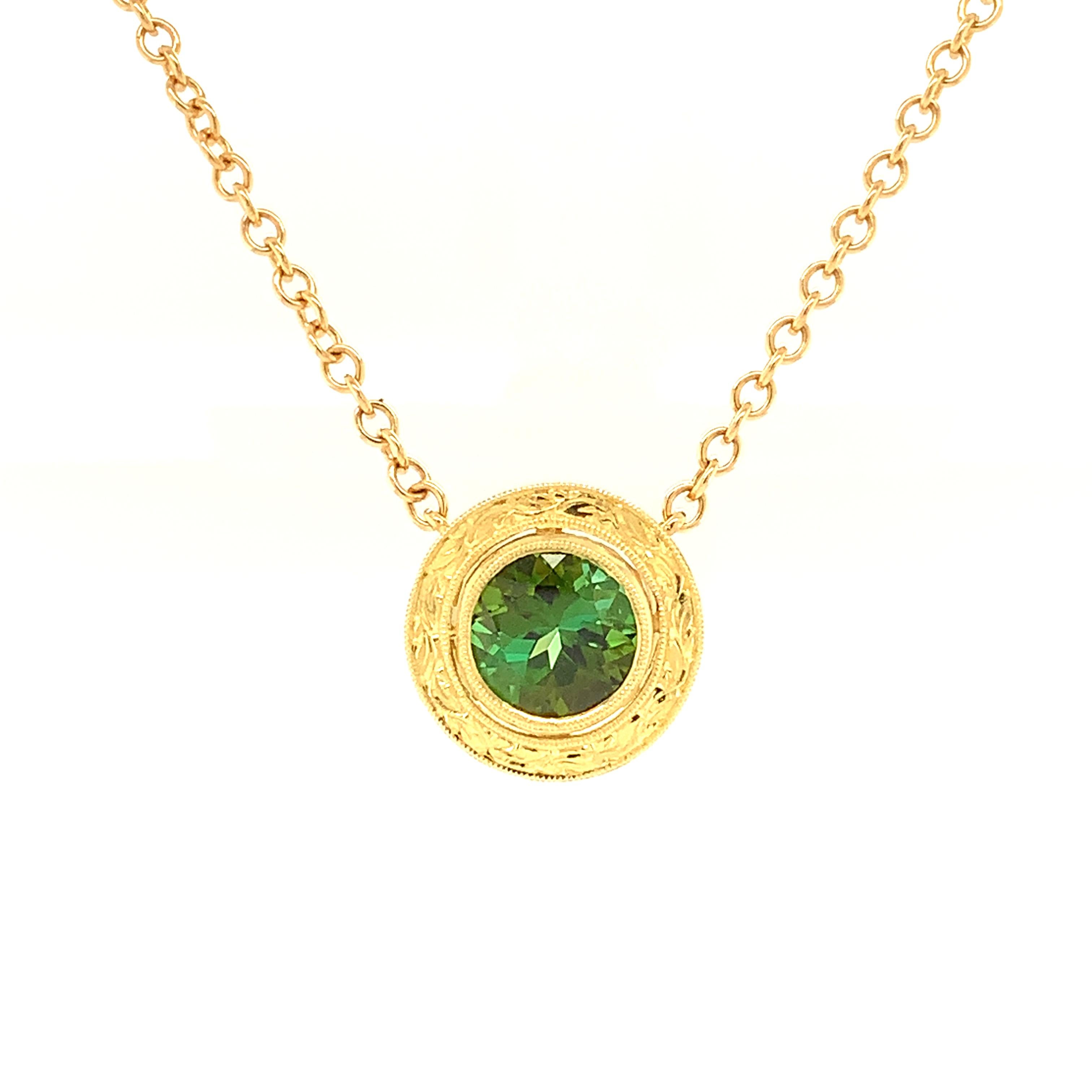 This pretty necklace is part of our Day and Night Signature Collection and features a beautiful 2.45 carat verdant green tourmaline. Handmade in 18k yellow gold by our Master Jewelers in Los Angeles, this necklace with its intricate details and hand