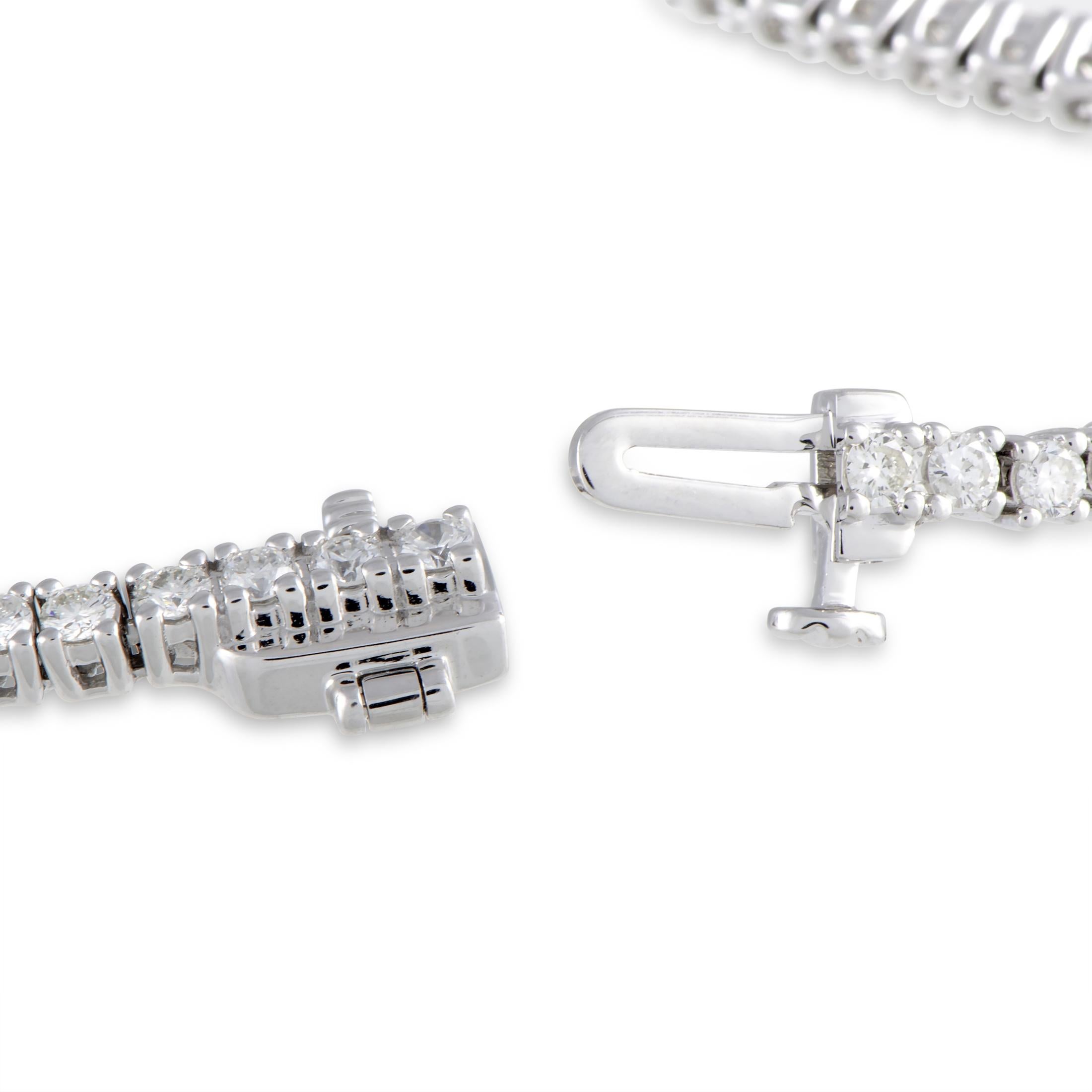 This tennis bracelet is made out of 14K white gold and diamonds that amount to 2.45 carats. The bracelet weighs 7.9 grams and measures 7.00” in length.
 
 Offered in brand new condition, this item includes a gift box.
