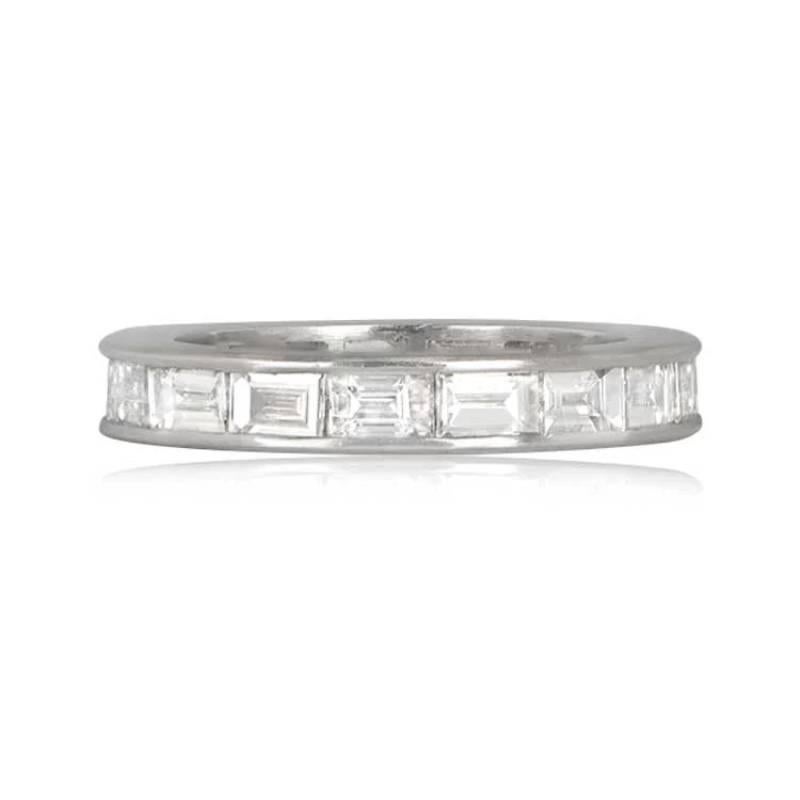A charming Baguette Diamond Wedding Band adorned with vibrant channel-set baguette-cut diamonds encircling its perimeter. The diamonds, with a quality of G/H or better, collectively weigh 2.45 carats. Crafted in platinum, the mounting adds an