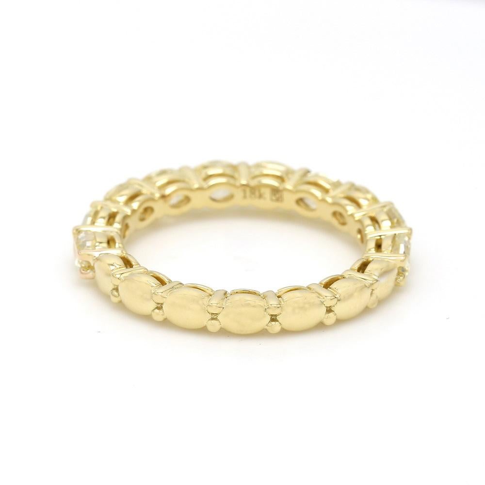 2.45ctw Oval Fancy Amarillo Diamante Anillo de la Eternidad Sz.6.5

Esta radiante alianza de eternidad de diamante amarillo fantasía ovalado de 2,45 quilates está fabricada en oro amarillo de 18 quilates. Talla 6,5 y redimensionable, pesa 3,7 gramos