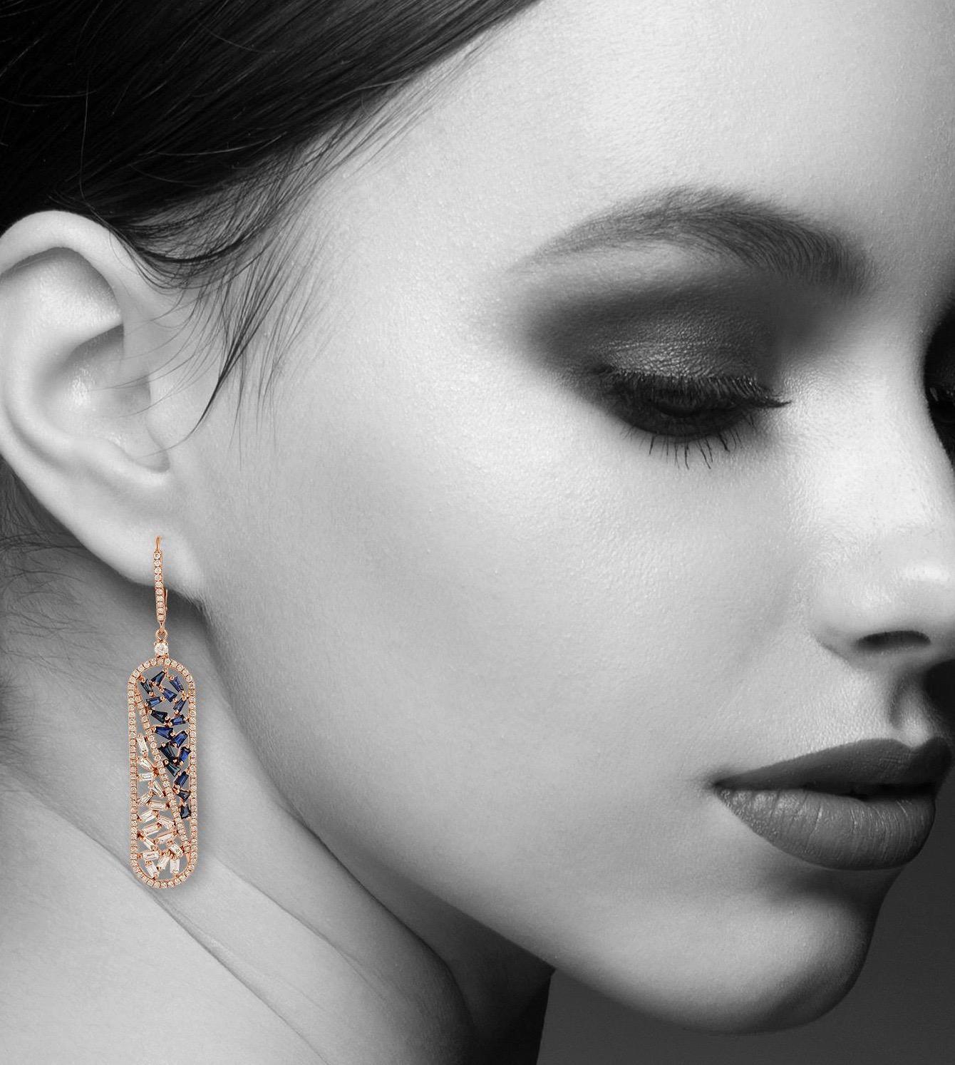 Handcrafted from 18-karat gold, these stunning drop earrings are set with 2.46 carats baguette diamonds and 1.63 carats blue sapphire. 

FOLLOW  MEGHNA JEWELS storefront to view the latest collection & exclusive pieces.  Meghna Jewels is proudly