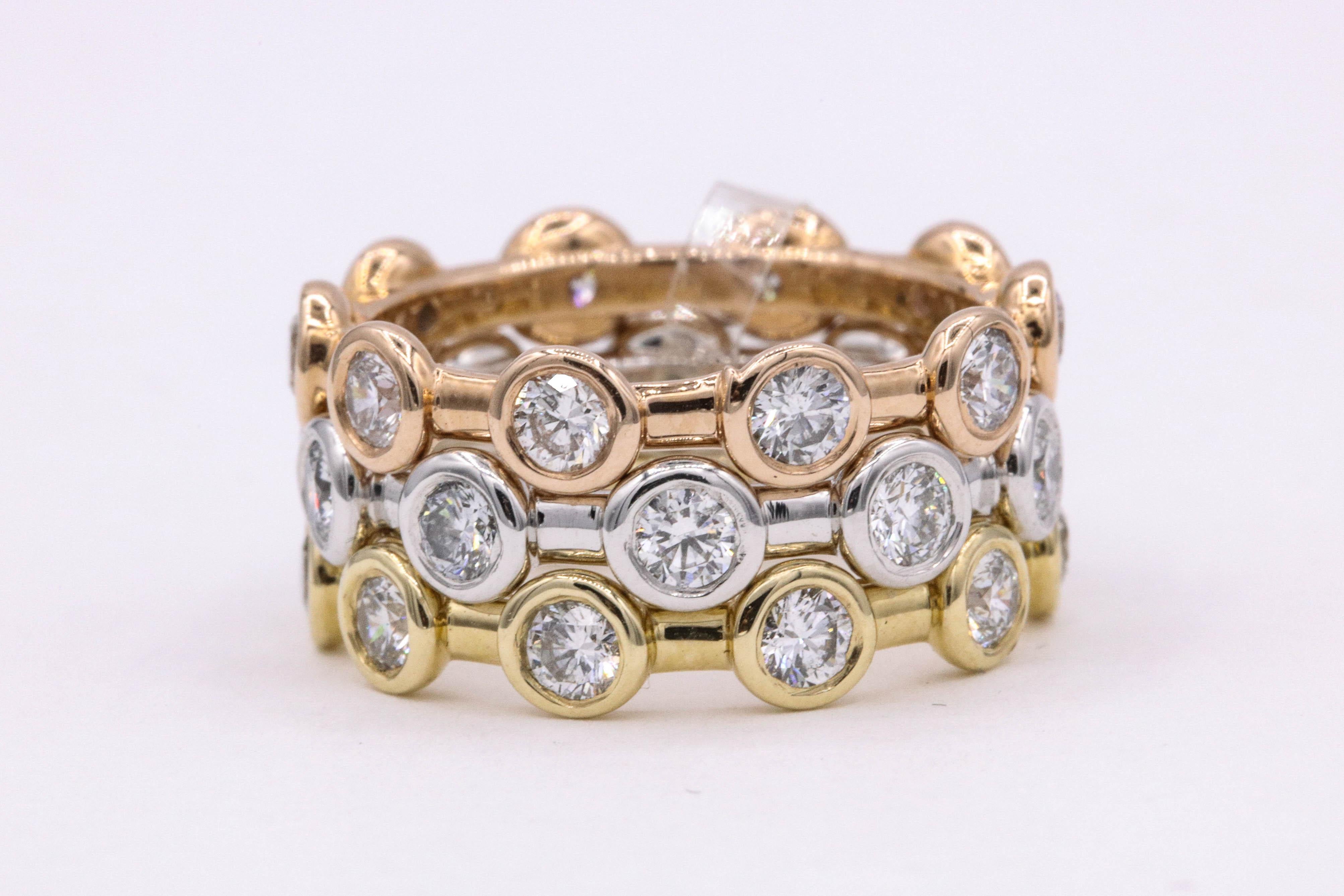 Diamond 'bubble' stackable rings featuring 30 round brilliants weighing 2.42 carats in 14k rose, white and yellow gold. 
Can be customize in any size and color.