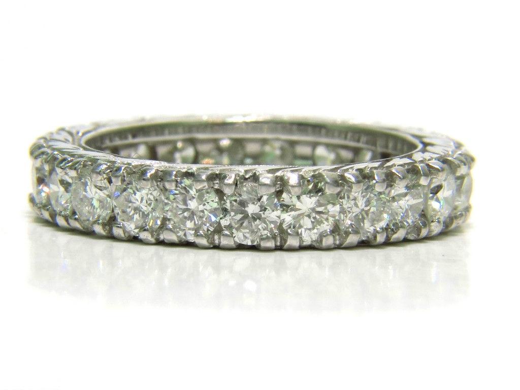 2.46 Carat Diamonds Eternity Band and Kissing 14 Karat In New Condition For Sale In New York, NY