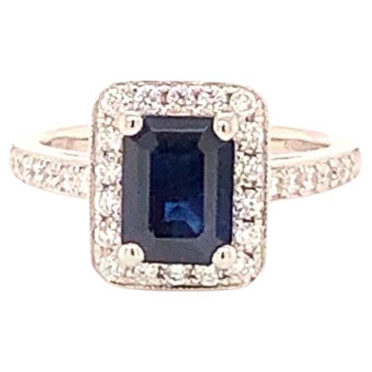 2.46 Carat Emerald Cut Blue Sapphire and Diamond Ring in Platinum For Sale