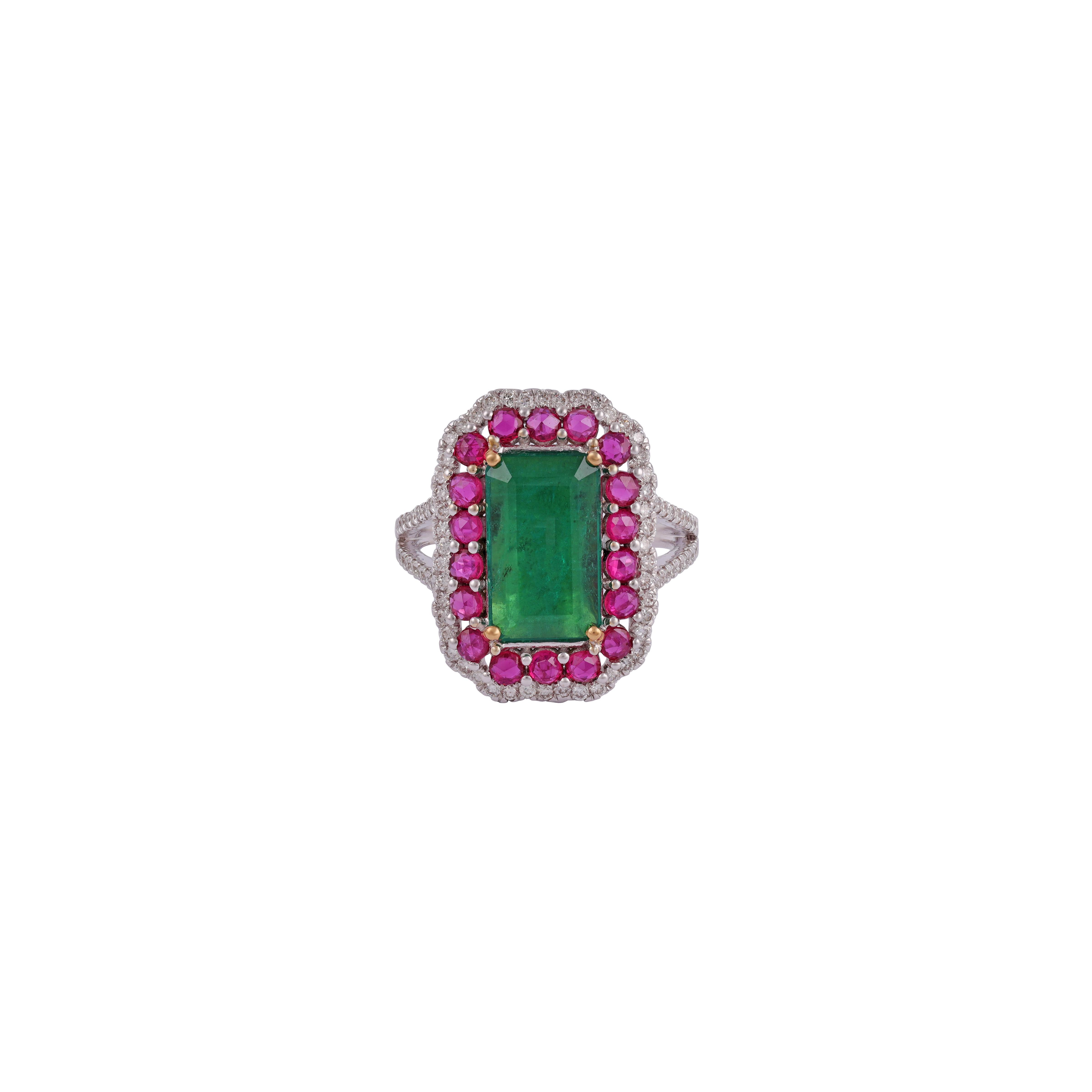 The Emerald set with brilliantly white and vibrant natural diamonds as well as rich red round cut rubies. Finished with dazzling diamonds and emeralds & Ruby's  provides the perfect backdrop for a diamond . 

Eye-catching and classically