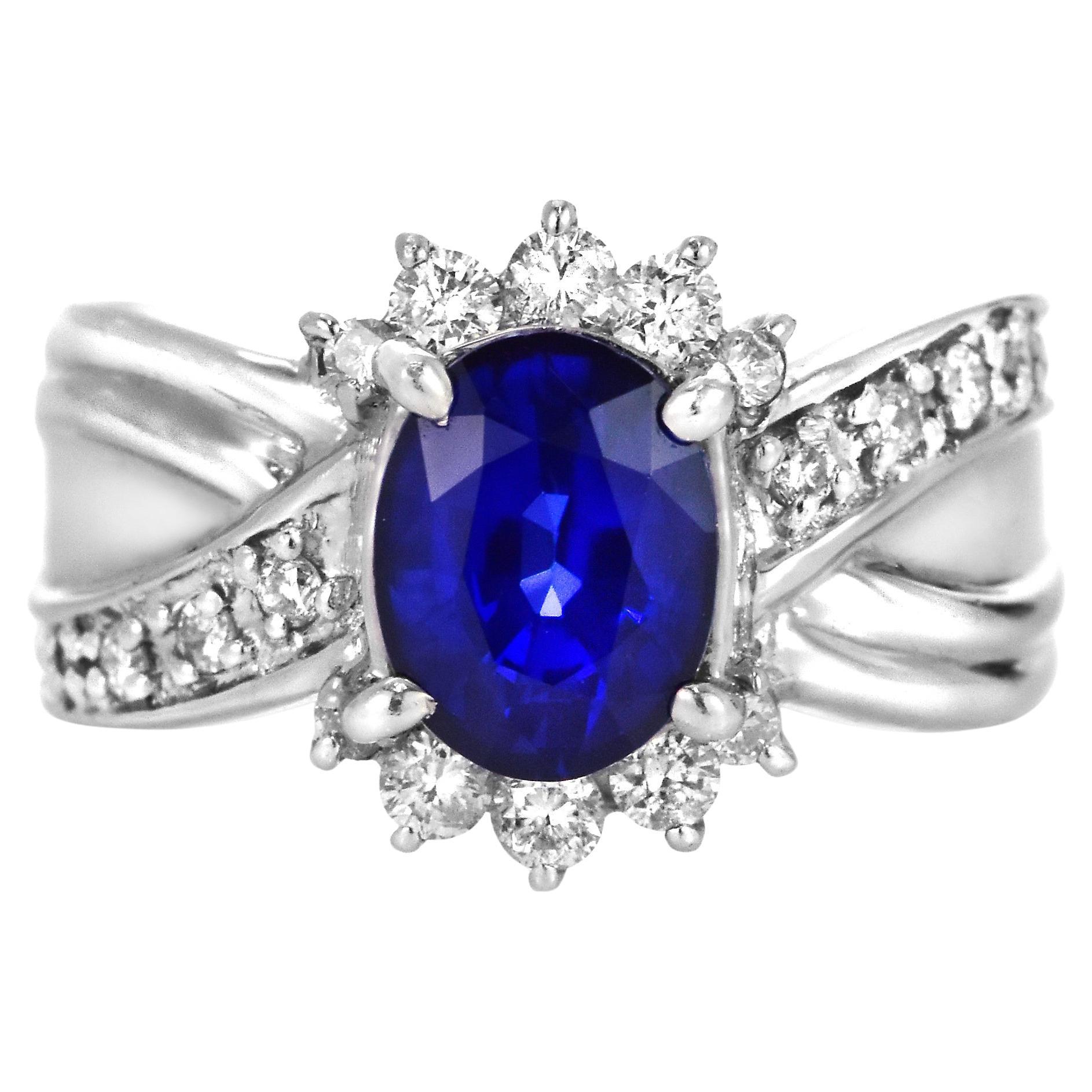 2.46 Carat Natural Royal Blue Sapphire and Diamond Ring Made in Platinum