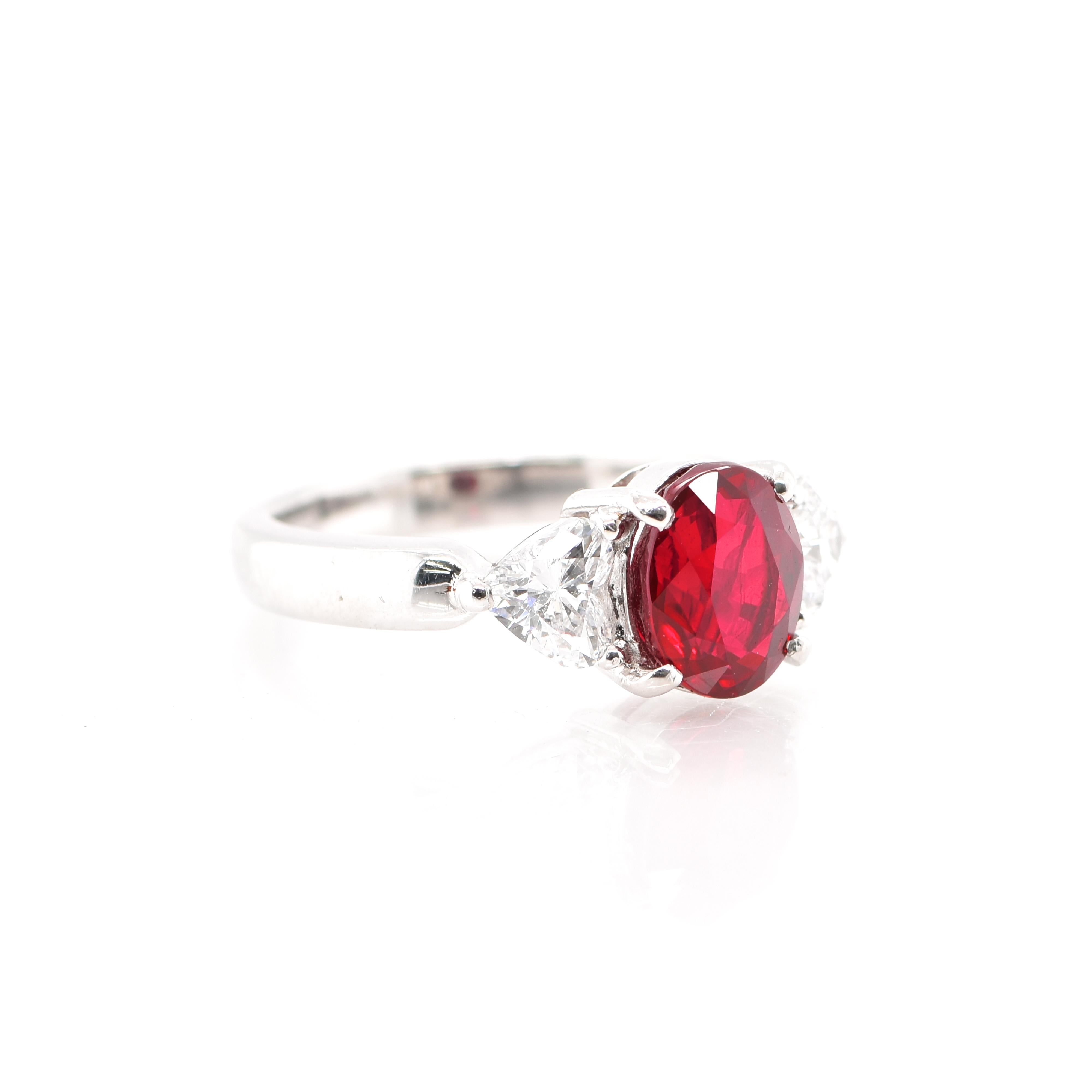 Oval Cut 2.46 Carat Pigeon's Blood Burmese Ruby and Diamond Ring Set in Platinum