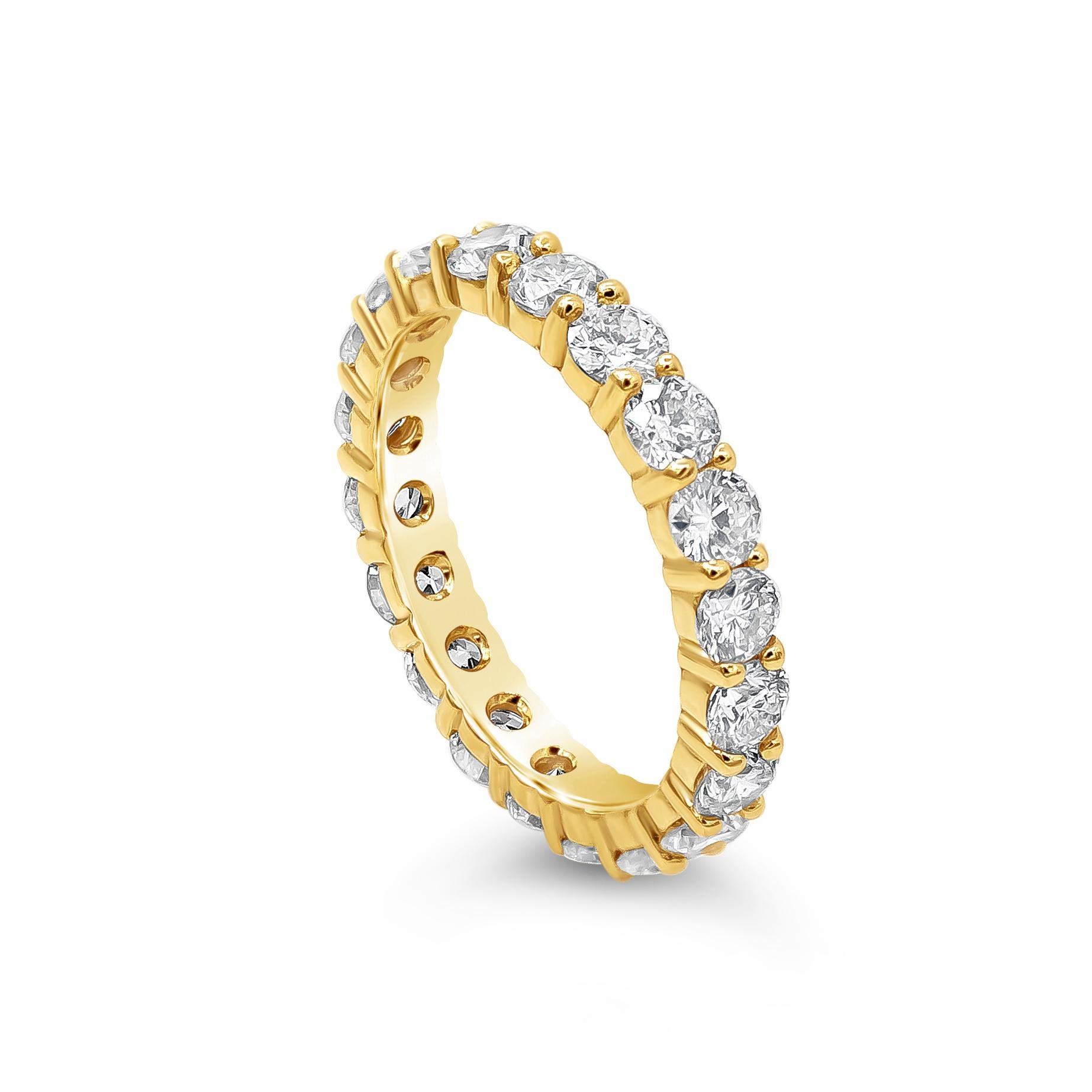 A classic eternity wedding band showcasing 20 round brilliant diamonds weighing 2.46 carats total, H Color and SI2-SI3 in Clarity. Set in a double shared prong setting and Made in 18K Yellow Gold, Size 6.5 US resizable upon request.

Style available