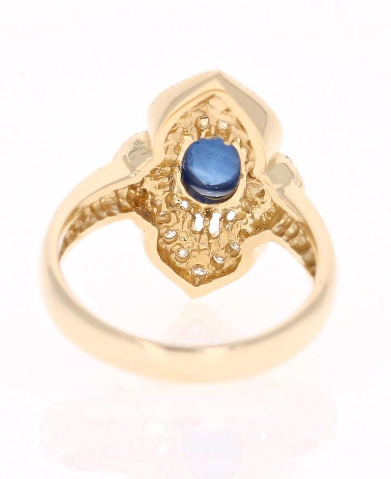 Oval Cut 2.46 Carat Sapphire Diamond 14 Karat Yellow Gold Diamond Ring For Sale