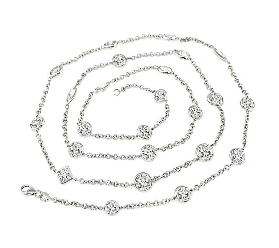 This is an elegant 14k white gold by the yard necklace. The necklace is set with sparkling round, old mine, princess and marquise cut diamonds that weigh approximately 24.60ct. The color of these diamonds is G-J with VS2 clarity. The necklace