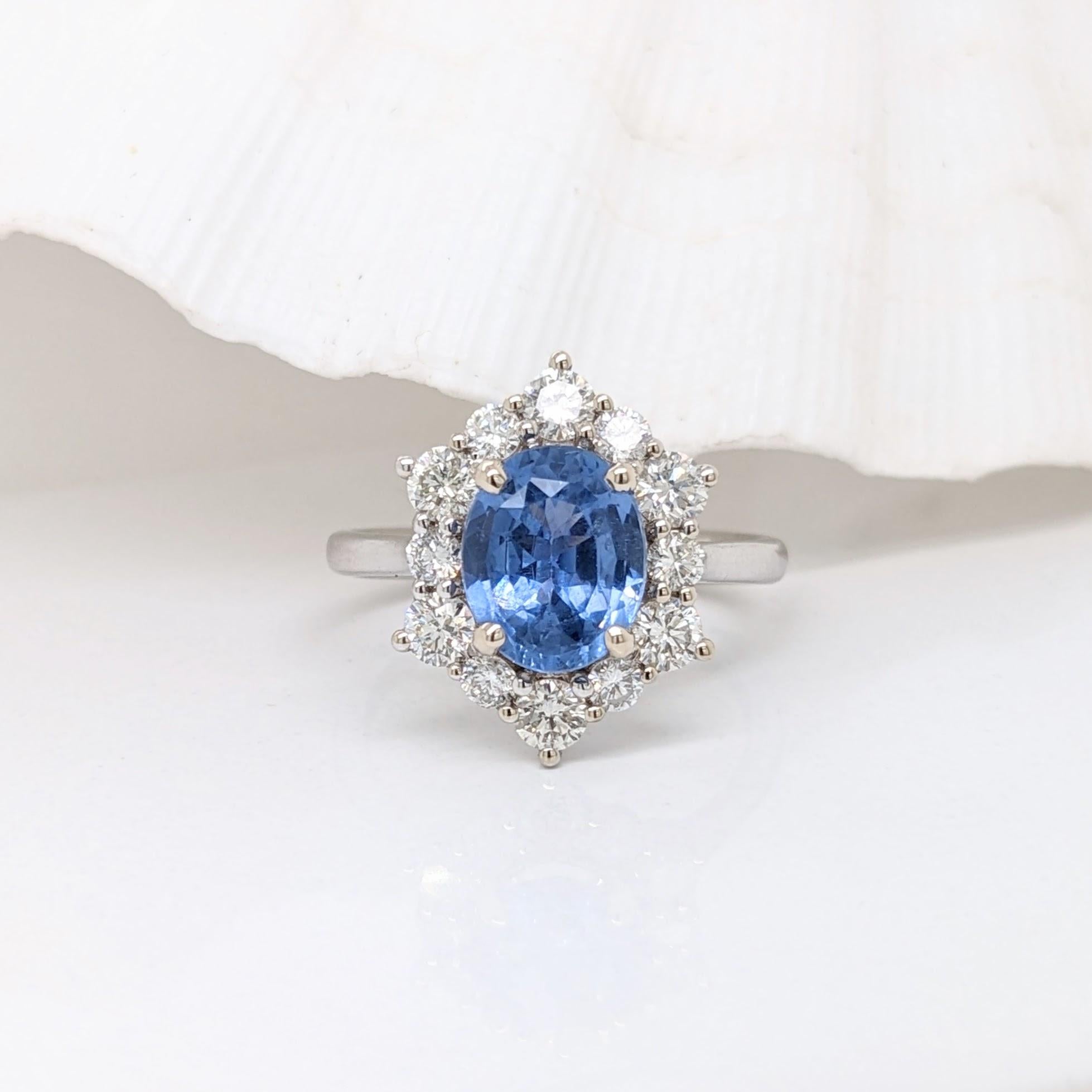 Stunning is an understatement for this ring! The all natural diamond halo and accents perfectly emphasize the blue in this sapphire from Ceylon. The halo design gives a slightly vintage feel but in the most elegant way. This ring is now ready to