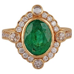 2.47 Carat Carved Zambian Emerald & Cluster Diamond Ring in 18k Gold