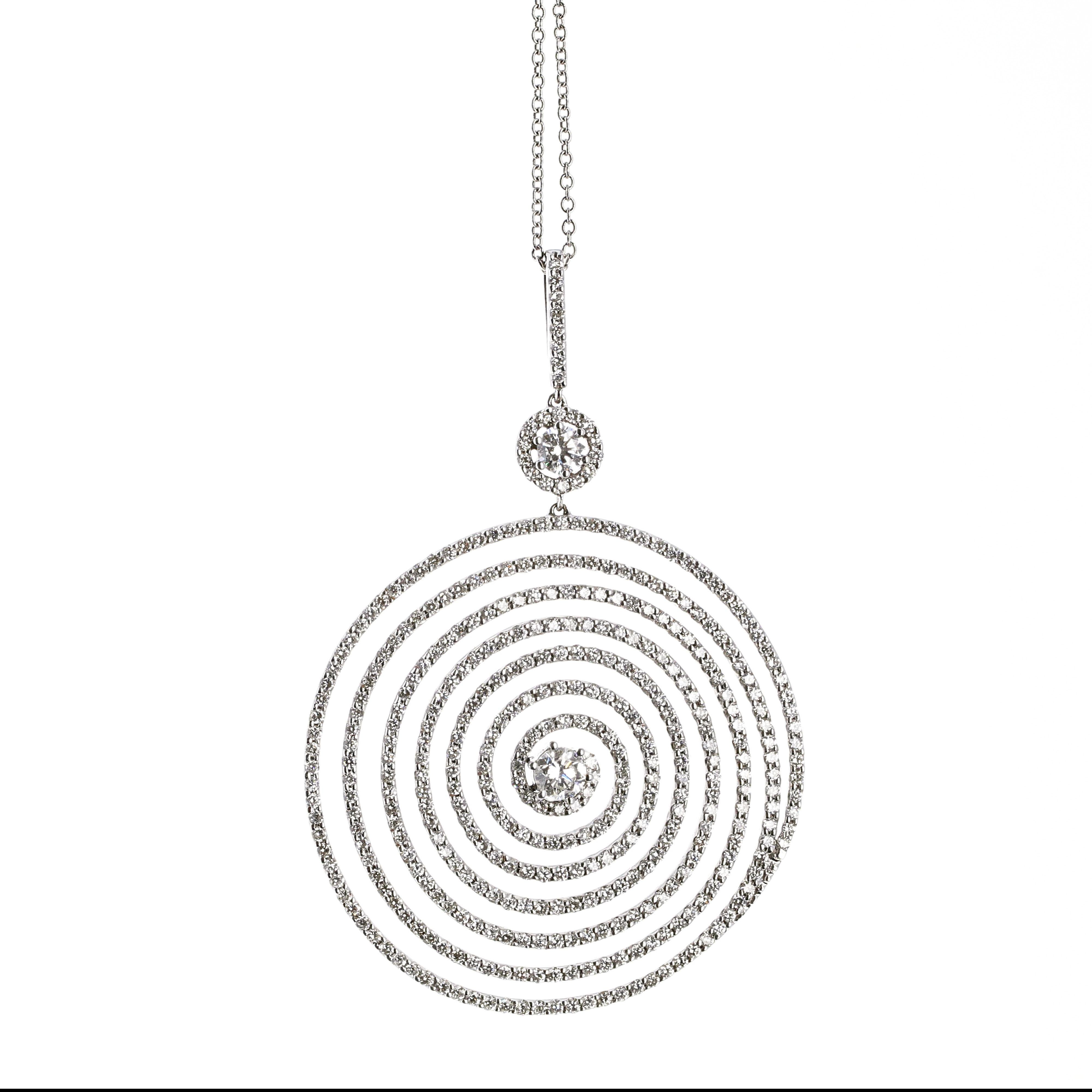 18 karat white gold diamond swirl pendant. There is a total diamond weight of 2.47 carats. The pendant has 2 large round brilliant white diamonds weighing a total of 0.41 carats and 400 smaller round brilliant white diamonds weighing a total of 2.06