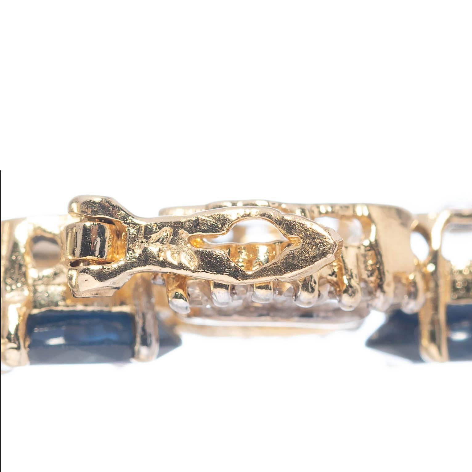Oval Cut 24.74 Carat Oval Sapphire Baguette Diamond Gold U Link Bracelet For Sale