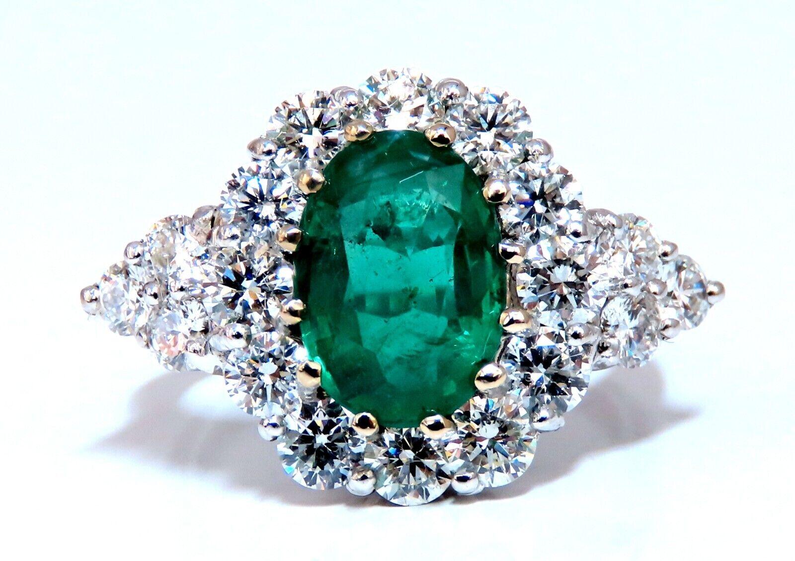 GIA certified natural emerald and diamonds ring.

Report number 22255-33641

Stating 2.47 carat. Green color and transparent.

F2 clarity enhanced.

Measures 10.6 by 7.5 mm

2.20 carat side diamonds.
round full cut brilliant g / h color
Vs2