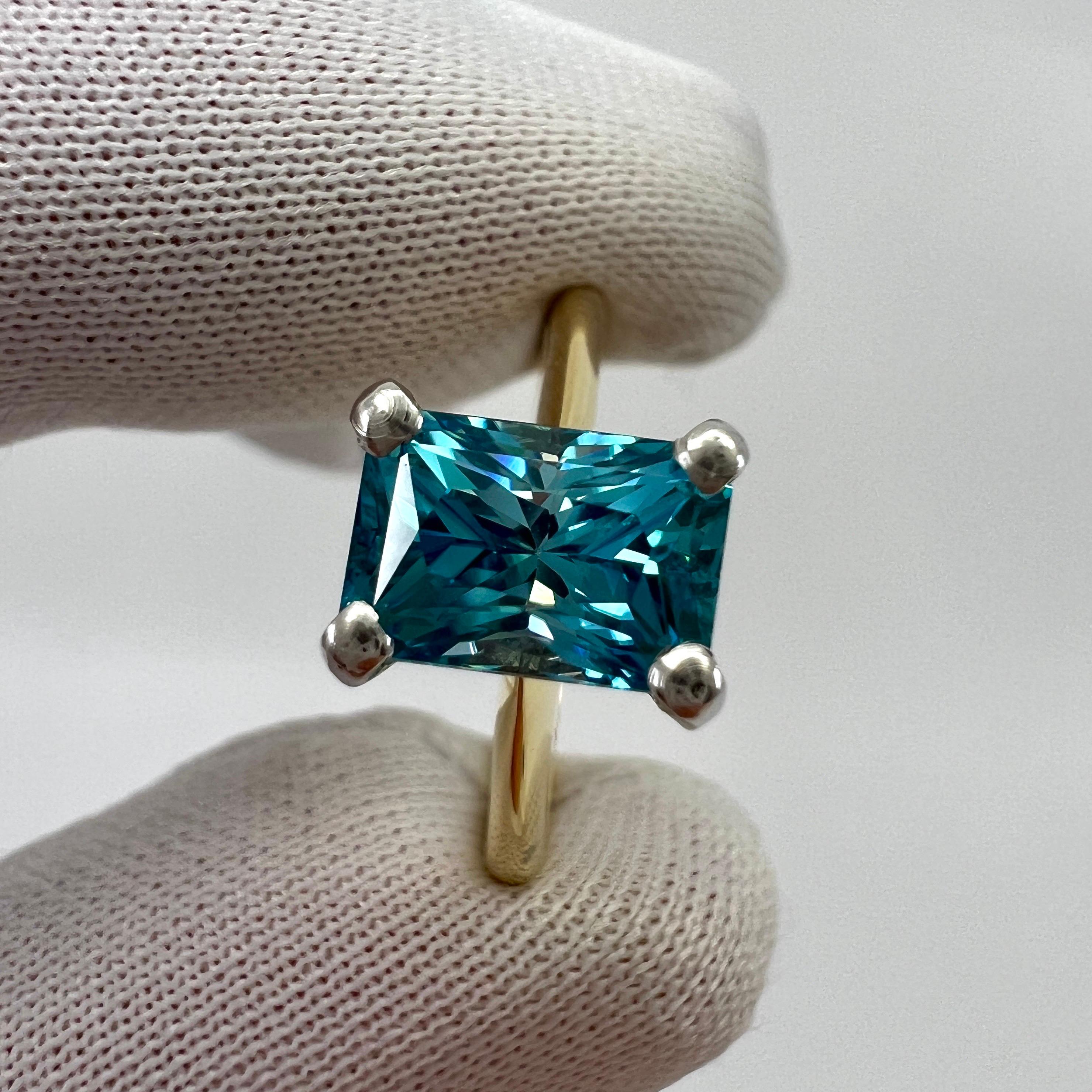 Women's or Men's 2.47ct Vivid Blue Zircon Fancy Emerald Radiant Cut 18k Gold Solitaire Ring For Sale