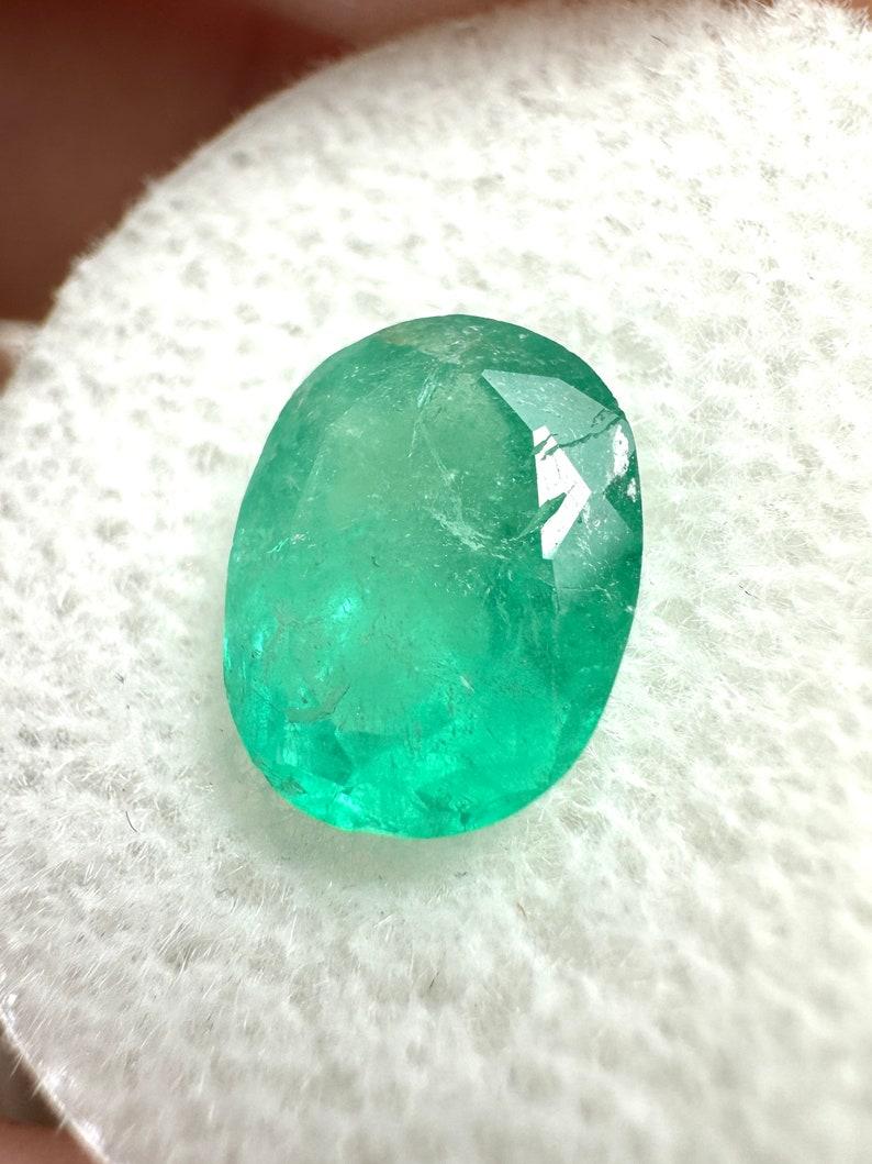 Stone: Emerald
Weight: 2.48-carats
Shape: Oval Cut
Clarity: Semi-Transparent
Luster: Good
Color: Green
Measurements: 9.78mm x 7.90mm x 5.48mm
Geographic Origin: Colombia
Treatment: Natural, Oiling

Comments: Due to their growth conditions in nature