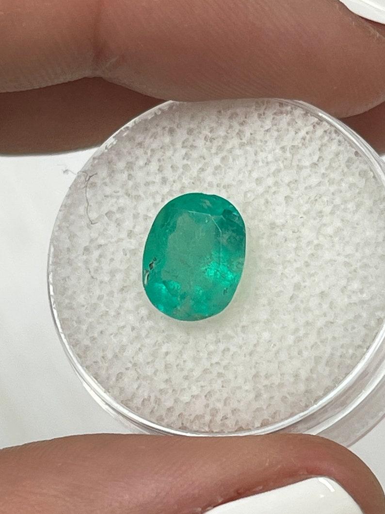 Women's or Men's 2.48 Carat 10x8 Medium Green Colombian Emerald - Oval Cut May Birthstone Gem For Sale