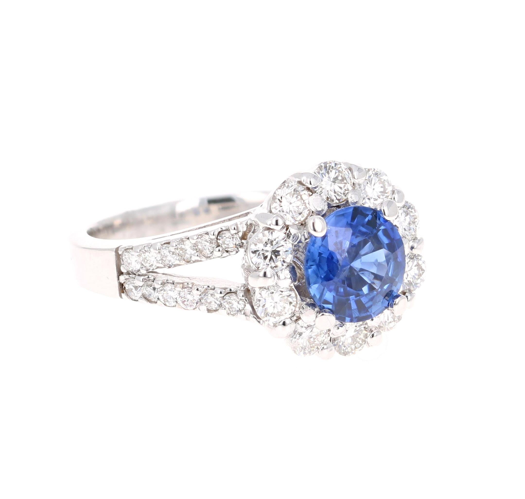 Gorgeous and stunning GIA Certified Sapphire and Diamond Ring - truly a one of a kind piece designed by our in house talented designer!! 

This ring has a Round Cut GIA Certified Blue Sapphire that weighs 1.46 carats set in the center of the ring.