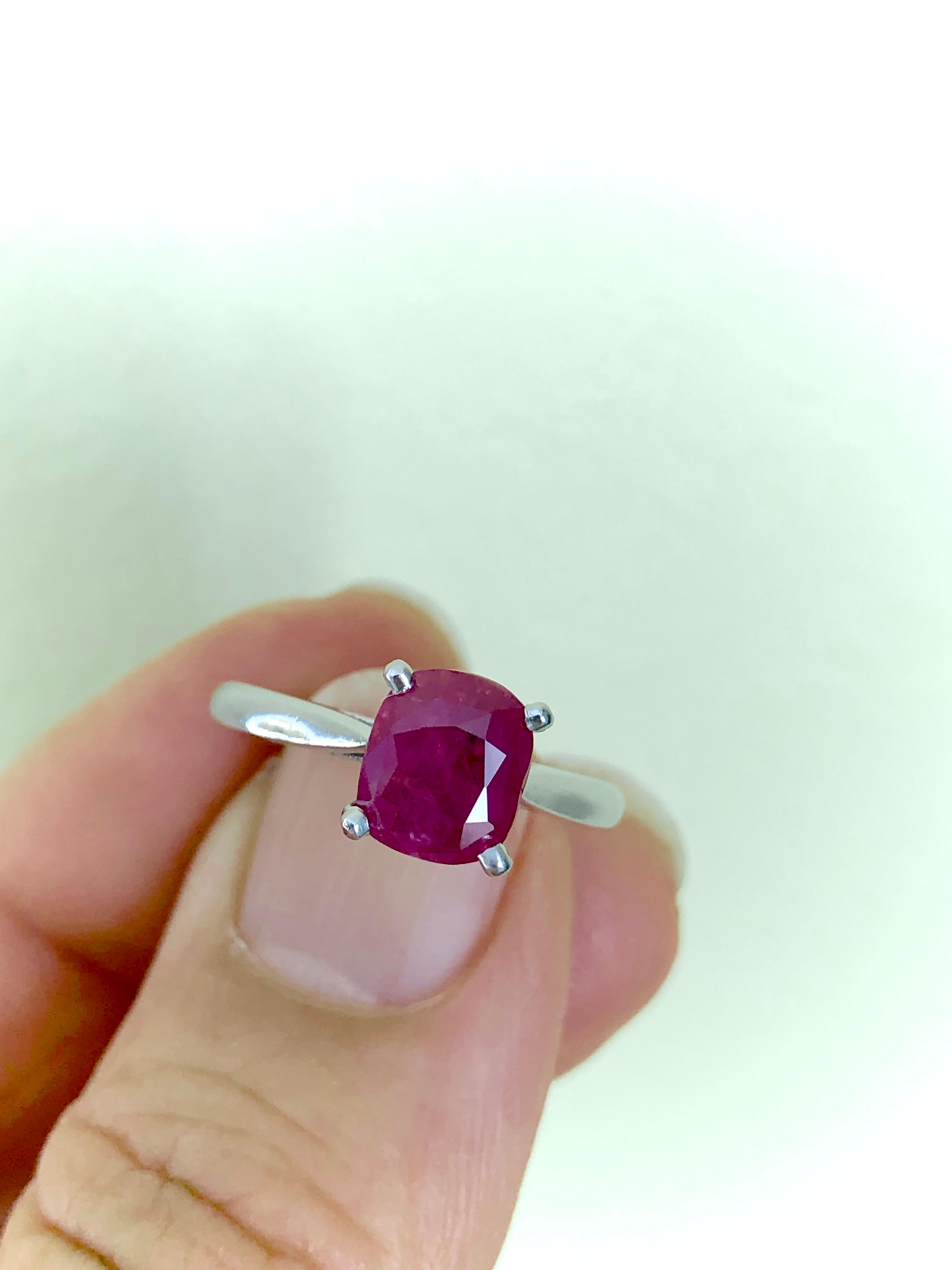 A classic natural ruby engagement ring estate. Set with one cushion-shaped old cut natural untreated ruby in a prong setting open back with a weight of 2.48 carats. A classic solitaire design 950 platinum settings. Currently a US size 6:25 and