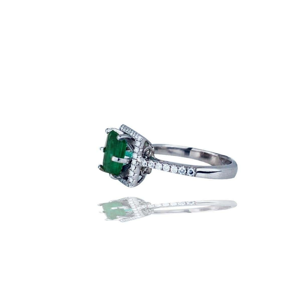 Stunning, Colombian Emerald set in Halo Diamond Ring, 2.48 TCW
6.20-7.10 x 5.30 mm Emerald Cut Colombian Emerald is approximately 1.95 carat.
The rings diamonds are on the shank and halo and measure 1.3 mm each with a total weight of estimated .48