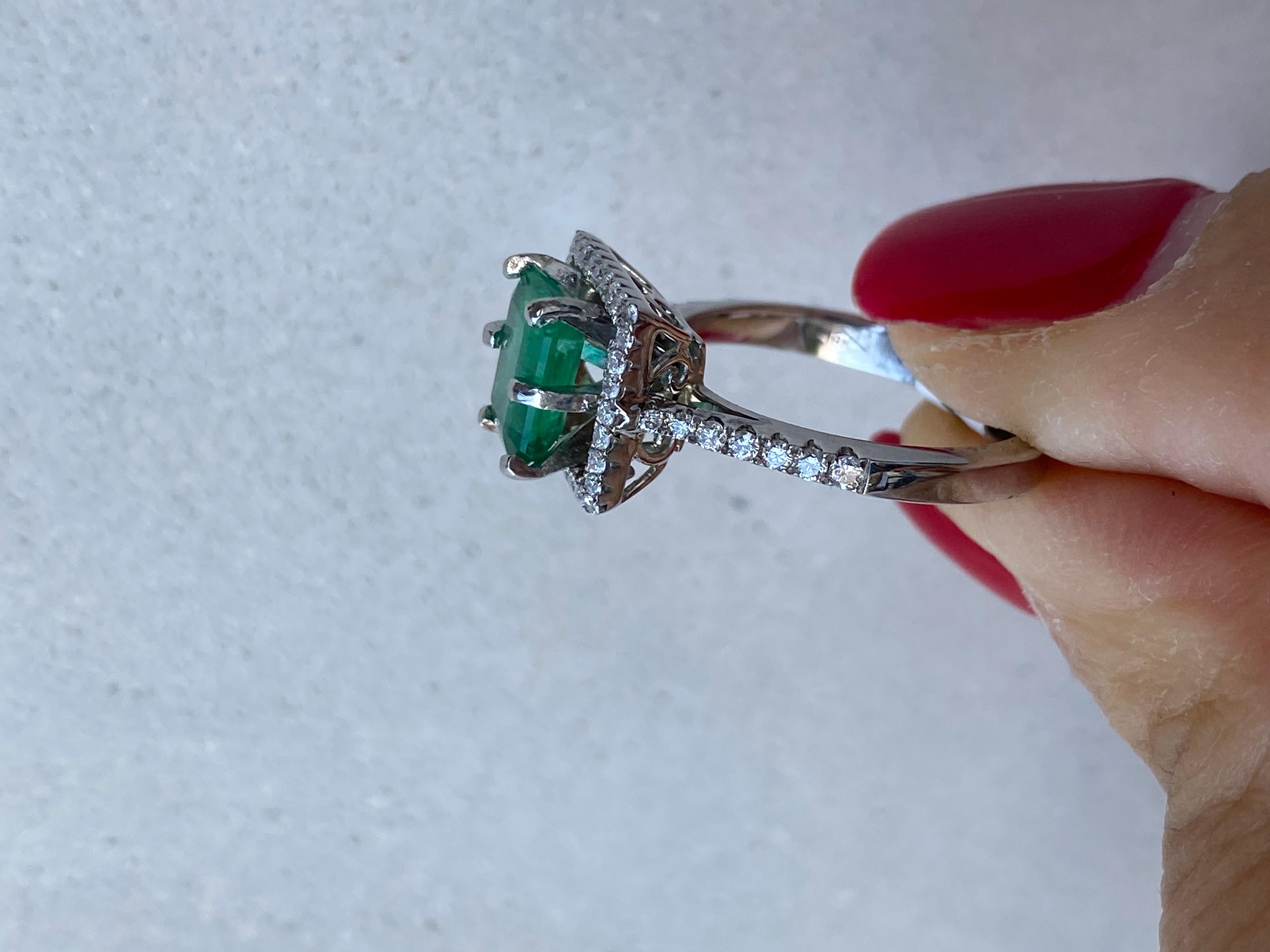 Emerald Cut 2.48 Carat Colombian Emerald and Diamond Halo Ring For Sale