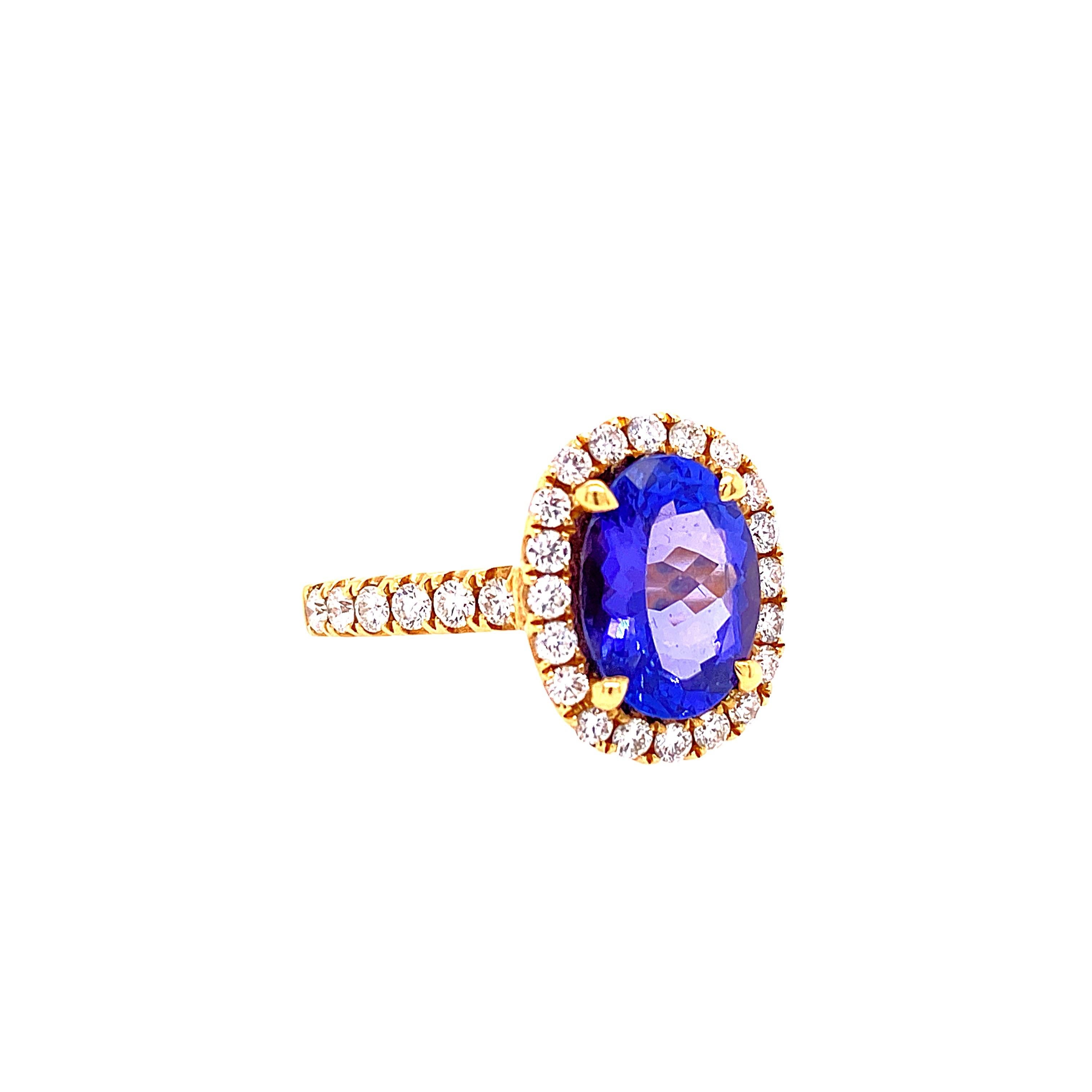 Oval Cut 2.48 Carat Oval Tanzanite and Diamond Ring For Sale