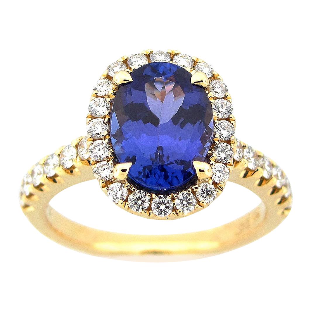 2.48 Carat Oval Tanzanite and Diamond Ring For Sale