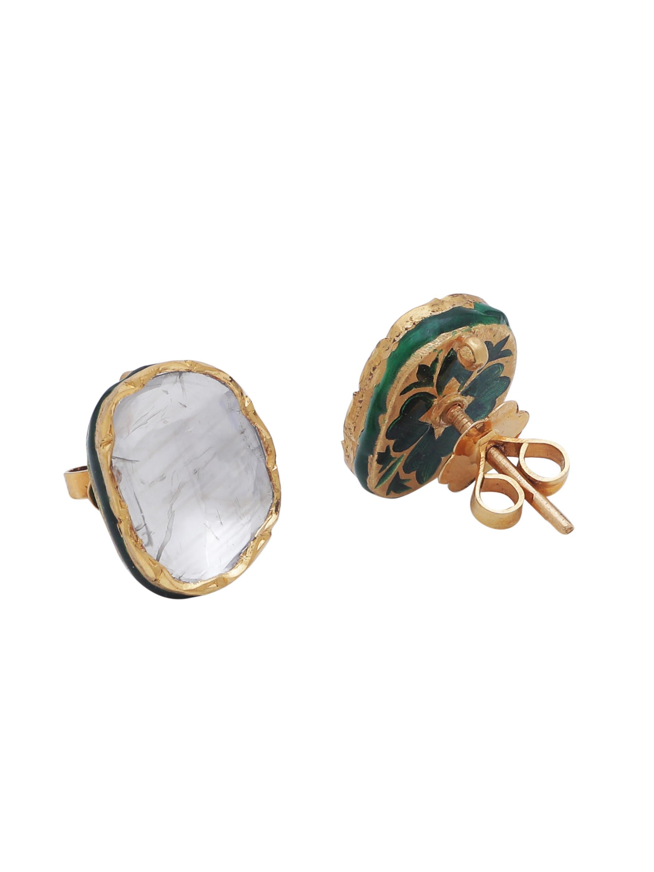 A pair of studs with 2 large Uncut Diamonds weighing 2.48 carats together. The earring is handcrafted in 18K Yellow gold and has really fine green enamel work at the back. The fine 