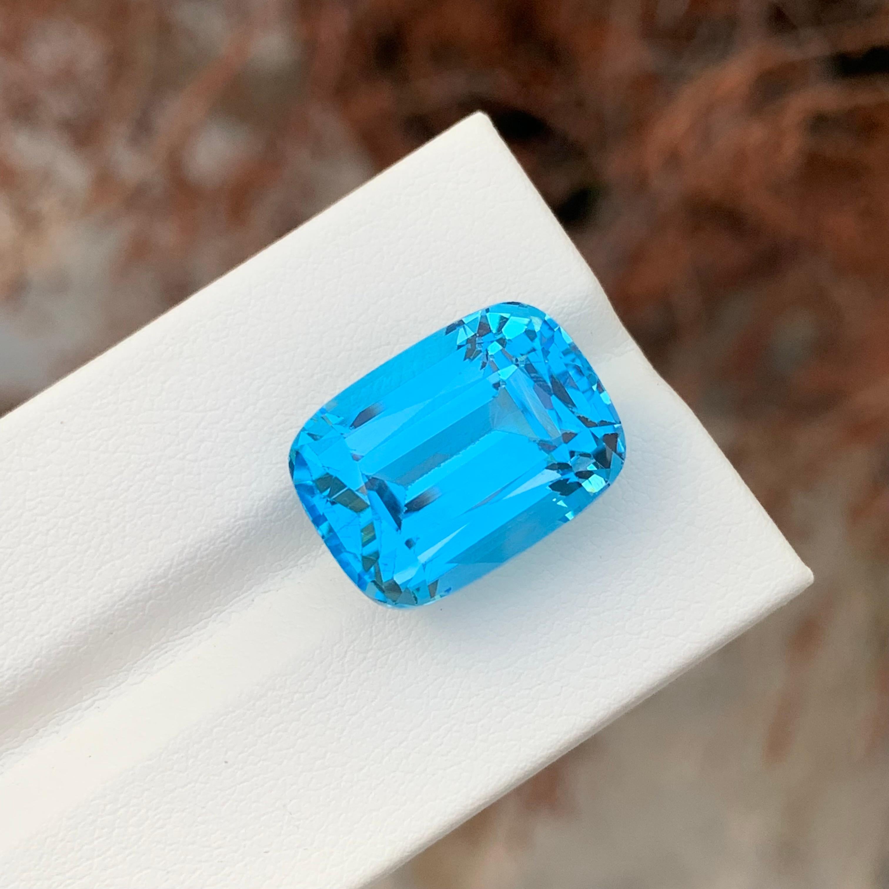 Arts and Crafts 24.80 Carat Gorgeous Faceted Electric Blue Topaz Cushion Shape Gemstone For Sale