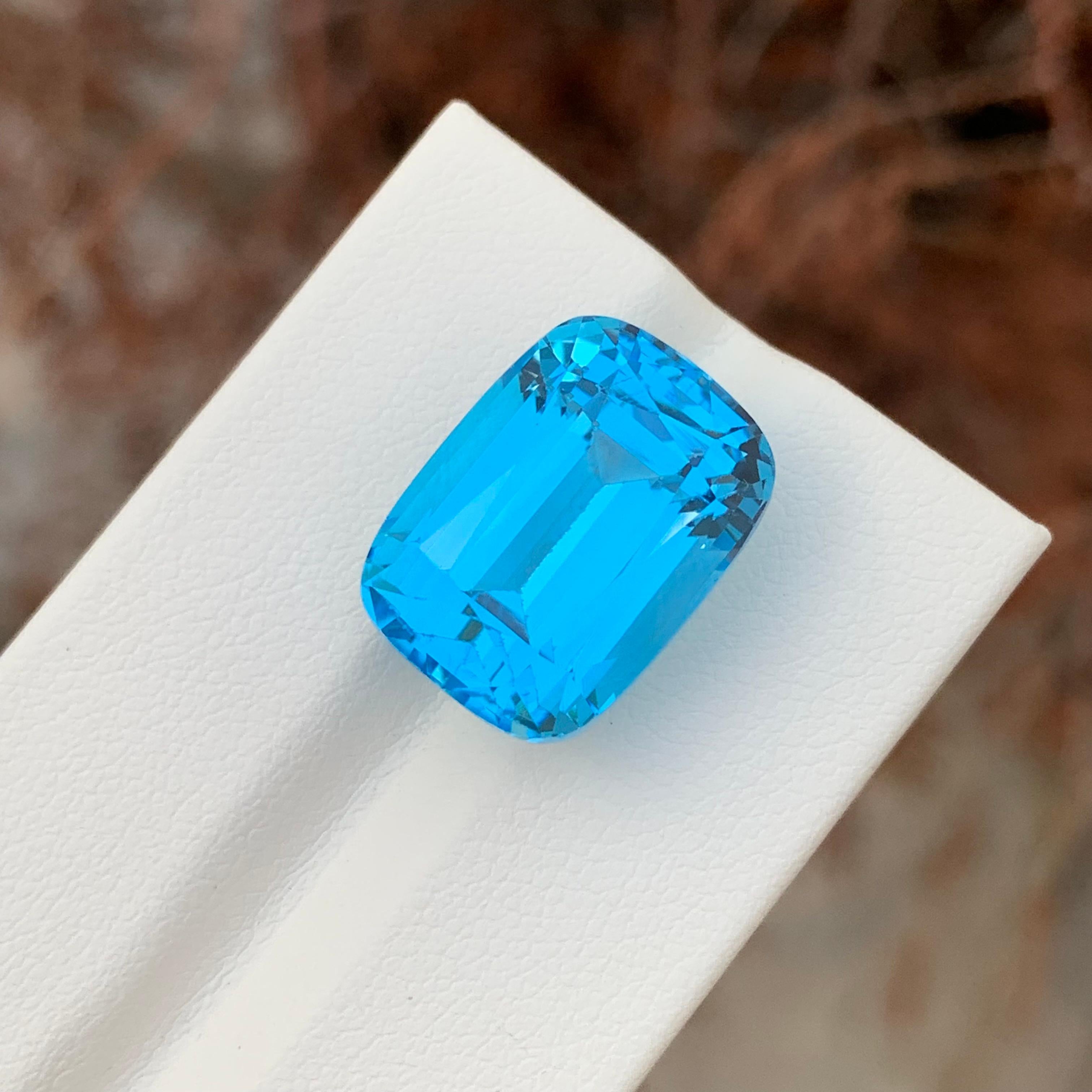 Cushion Cut 24.80 Carat Gorgeous Faceted Electric Blue Topaz Cushion Shape Gemstone For Sale