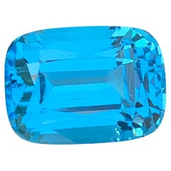 24.80 Carat Gorgeous Faceted Electric Blue Topaz Cushion Shape Gemstone