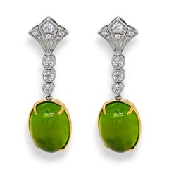 Orecchini in oro bianco e giallo con diamante rotondo e peridoto da 24,82 carati