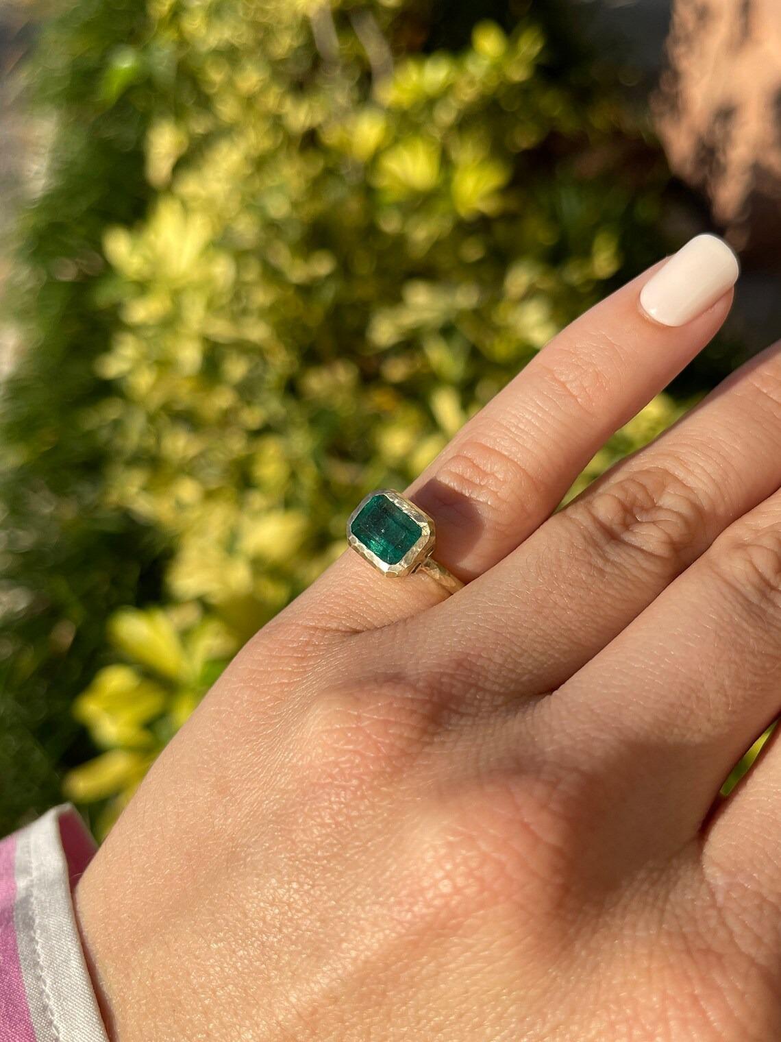 Modern 2.48ct 14K East to West Emerald Cut Emerald Solitaire Bezel Matte Hammer Ring For Sale