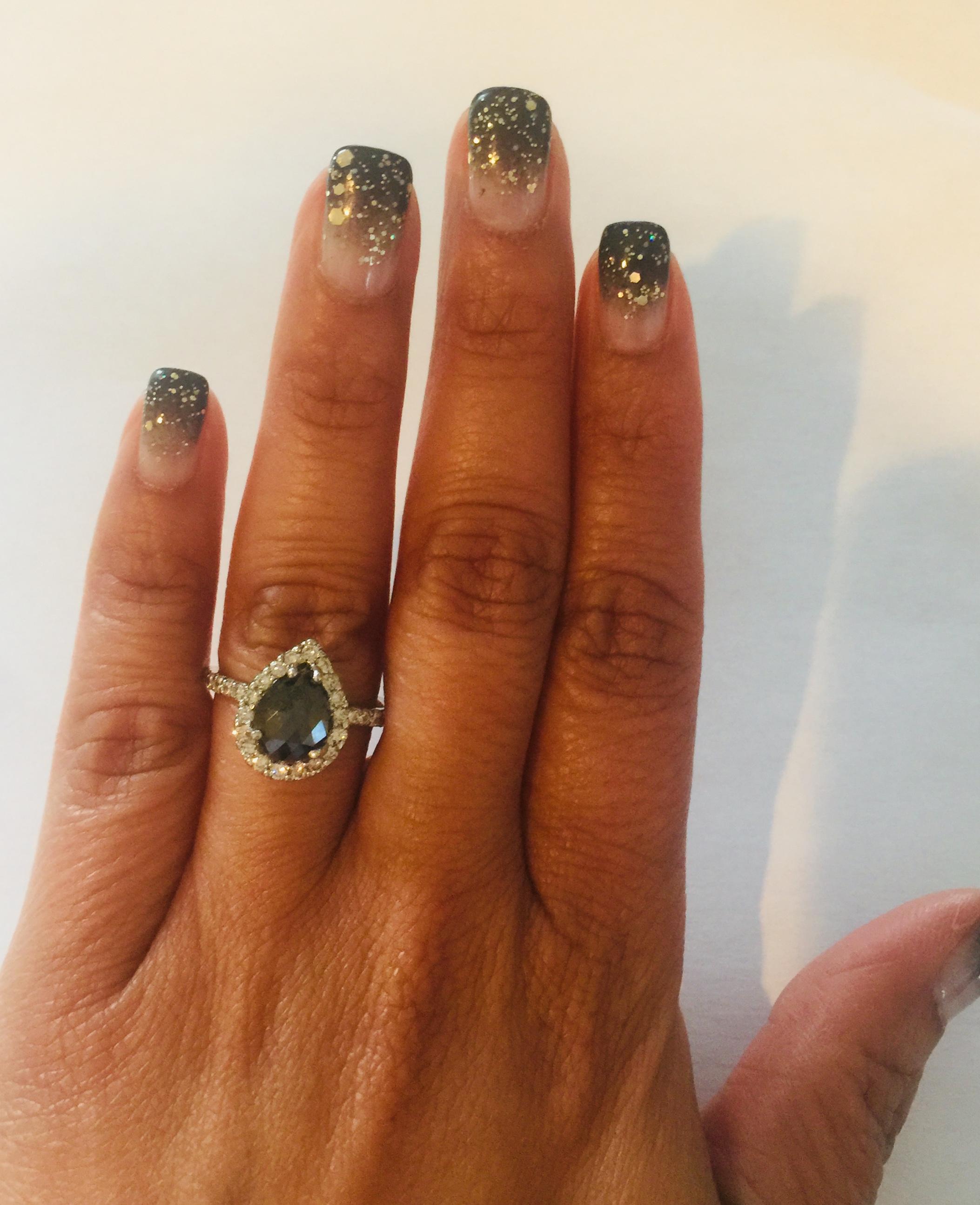 Pear Cut 2.49 Carat Black Diamond 14 Karat White Gold Halo Engagement Ring