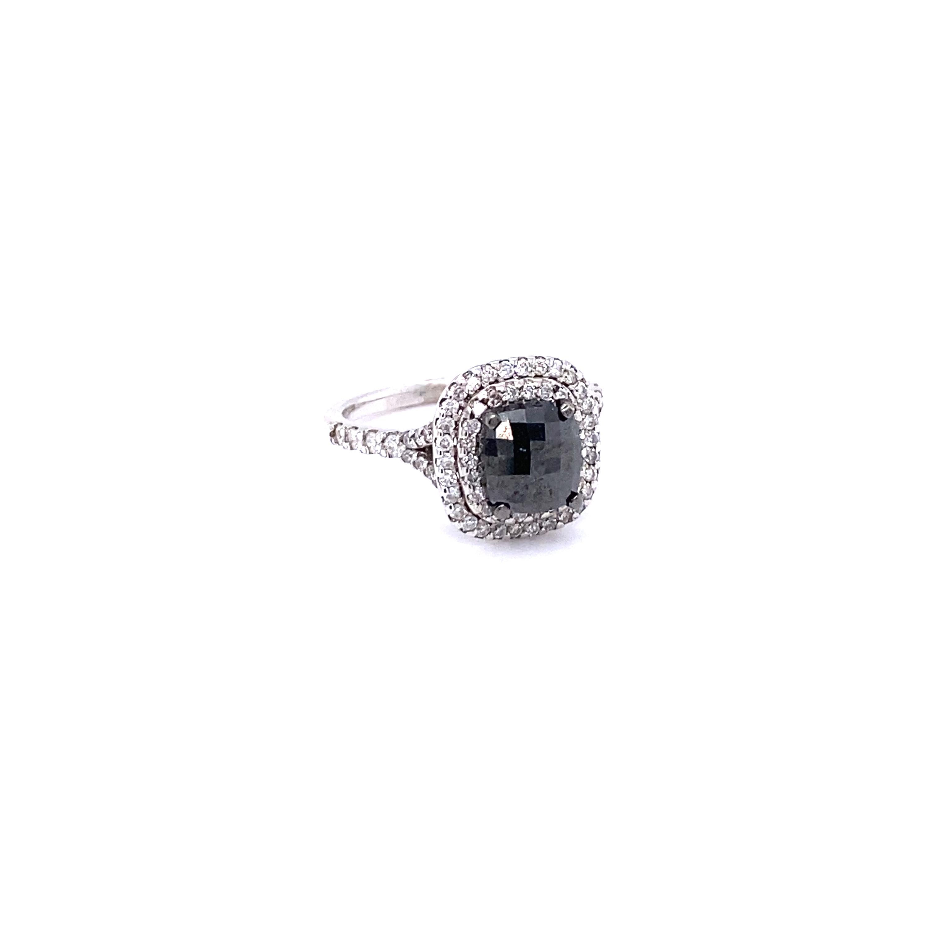 Stunning Cushion Cut Black and White Diamond Engagement Ring
Description as follows:

Cushion Cut Diamond = 1.86 carats
76 Round Cut Diamonds = 0.63 carats (Clarity: SI, Color: F)
14 Karat White Gold = 3.6 grams
Ring Size: 7 (complimentary ring
