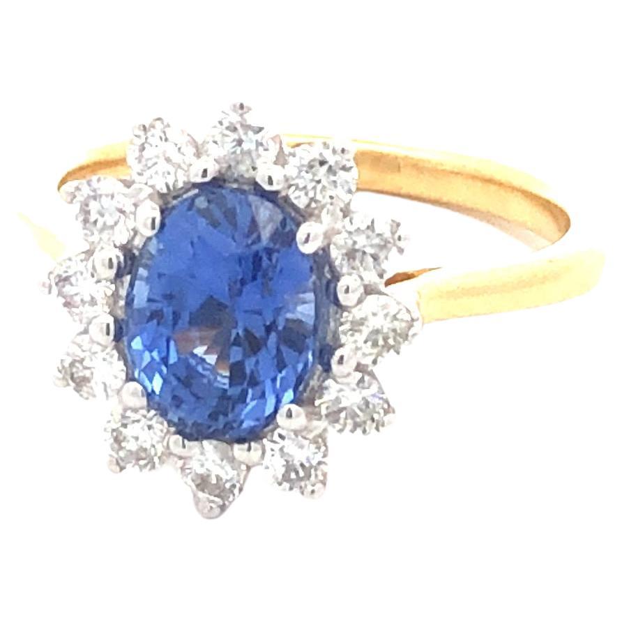 2.49 Carat Oval Blue Sapphire Round Diamond Hasbani 18Kt Halo Engagement Ring For Sale