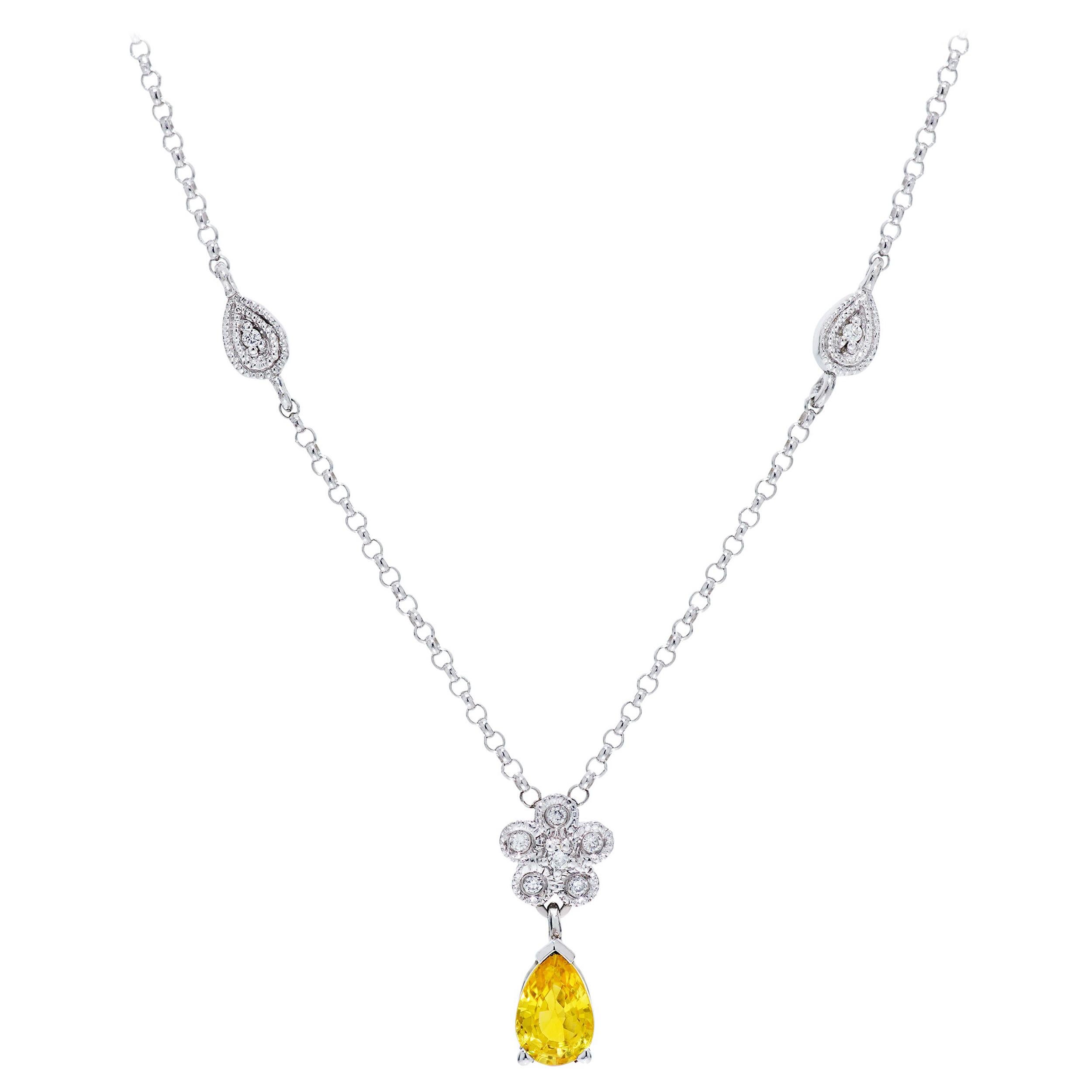 A wonderful matching necklace and earring set.  The necklace feature a 1.26 Carats of Yellow Sapphire and Diamonds.  The 18