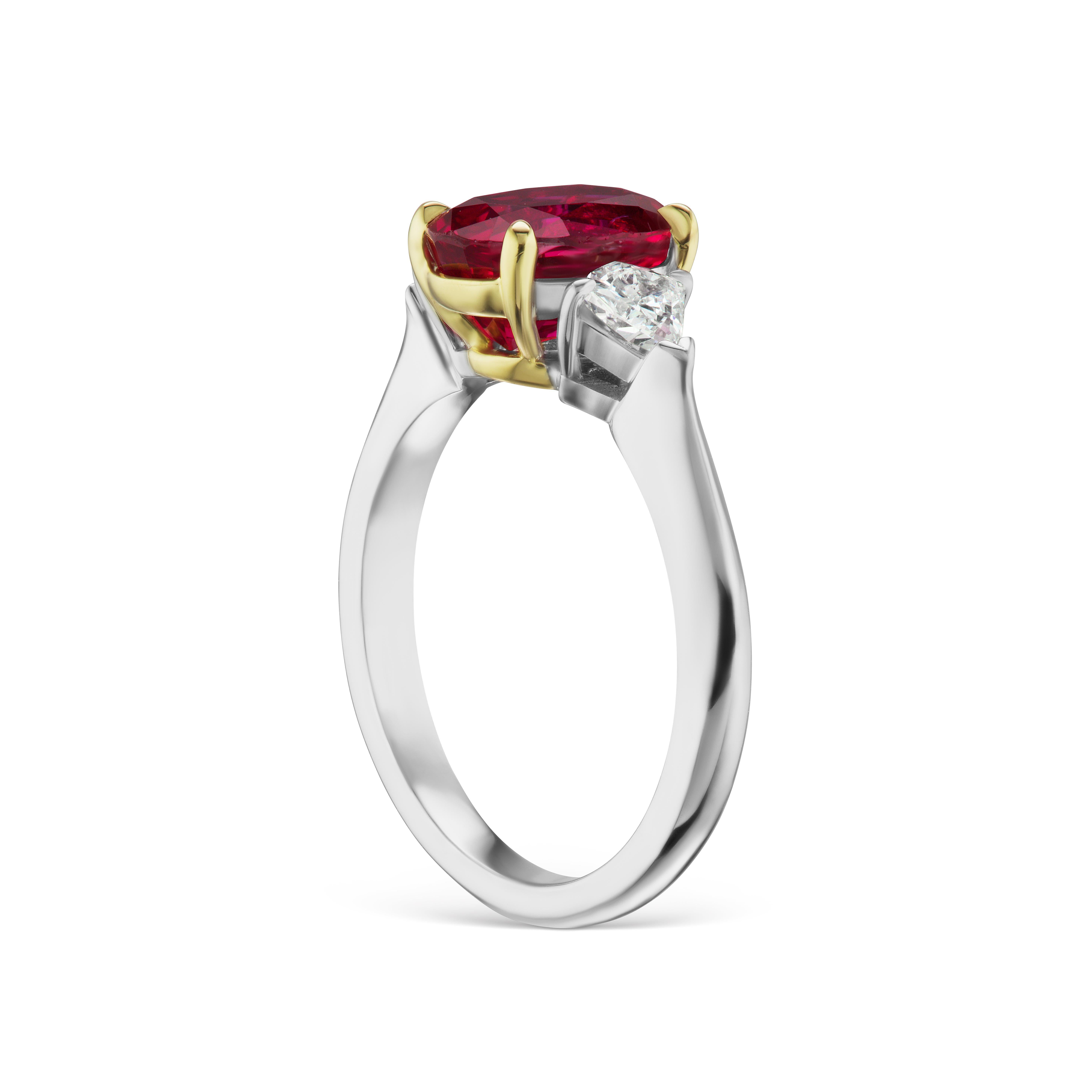 This stunning 2.49 Ct. GIA Certified Red Ruby is set in 14kt and 18kt with .50 ct. total weight of FVS Kite shaped side diamonds. If you don't see something, say something! We would be happy to work with you to create your dream ring!