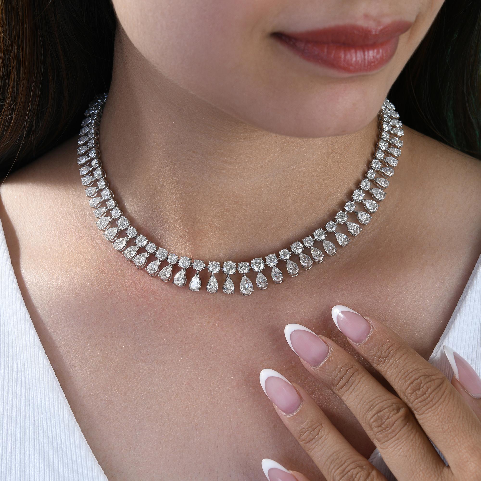 Este diamante natural de 24,97 qt con claridad SI y color HI  Collar gargantilla de oro blanco de 18 quilates con diamantes talla redonda engastados en fila y diamantes talla pera engastados debajo de los diamantes talla redonda formando un collar