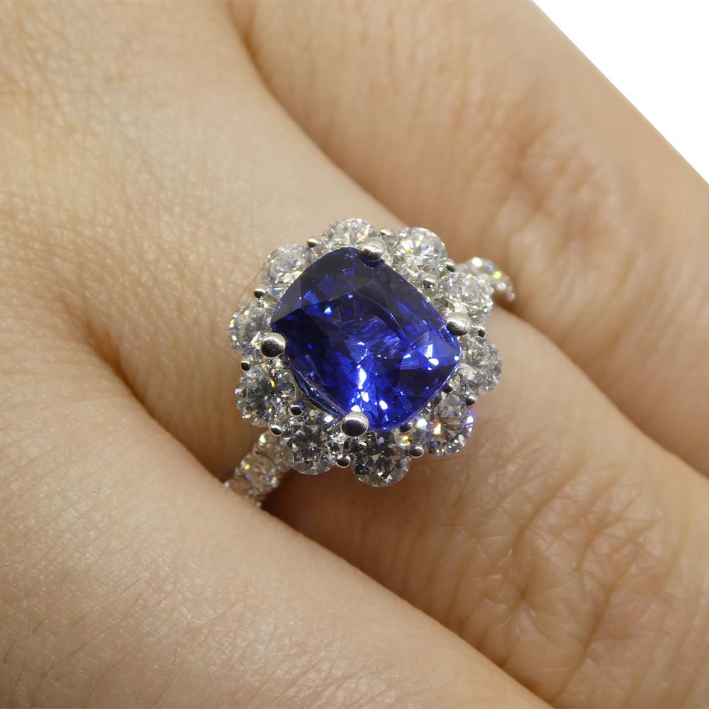  

Introducing our captivating Cushion-Cut Sapphire and Diamond Ring, a testament to elegance and refinement. At the heart of this exquisite piece sits a striking cushion-cut sapphire weighing 2.49 carats. The sapphire, with its transparent clarity