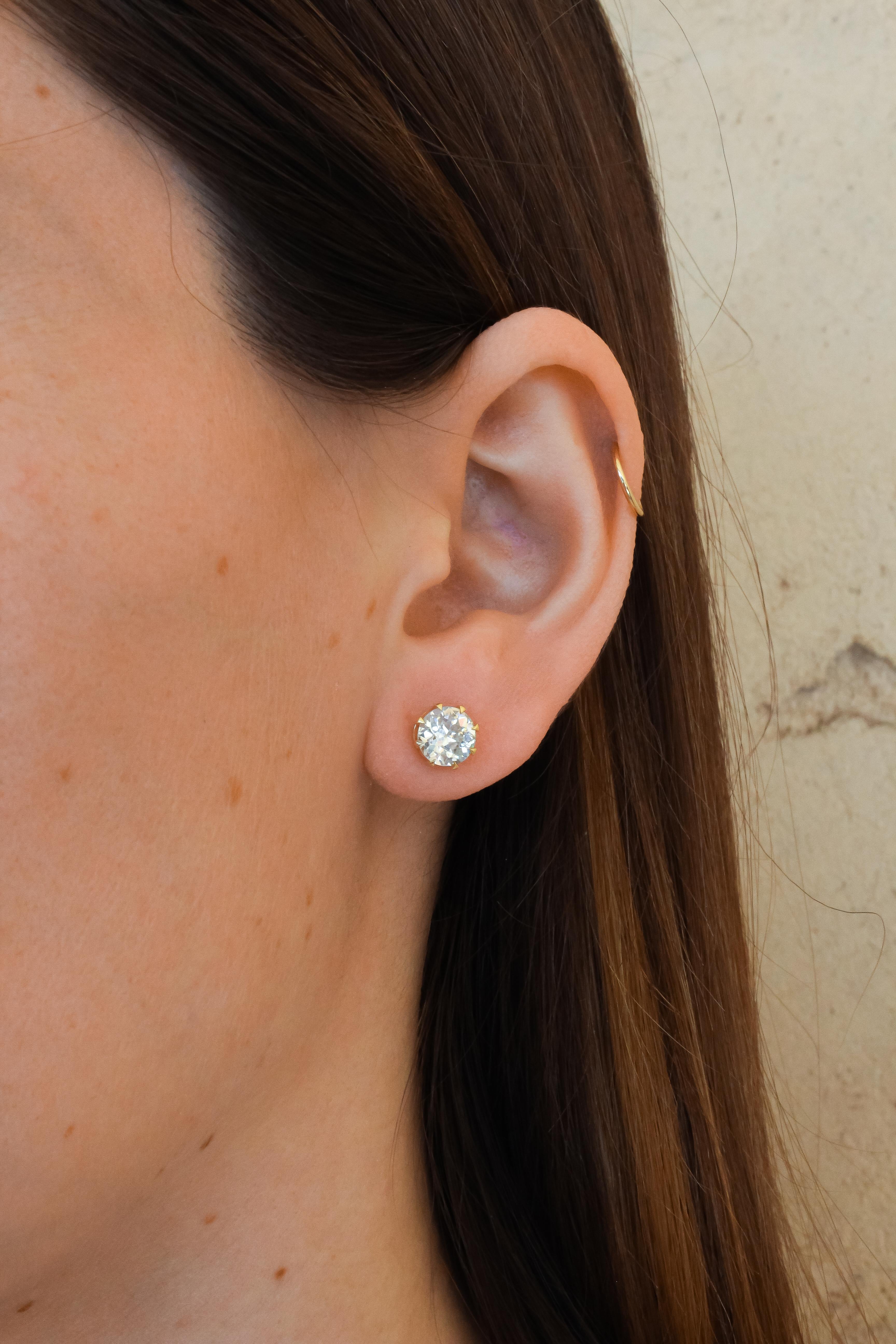 2.49ctw old European cut diamonds set in handcrafted 18k yellow gold earrings. The perfect jewelry box staple.