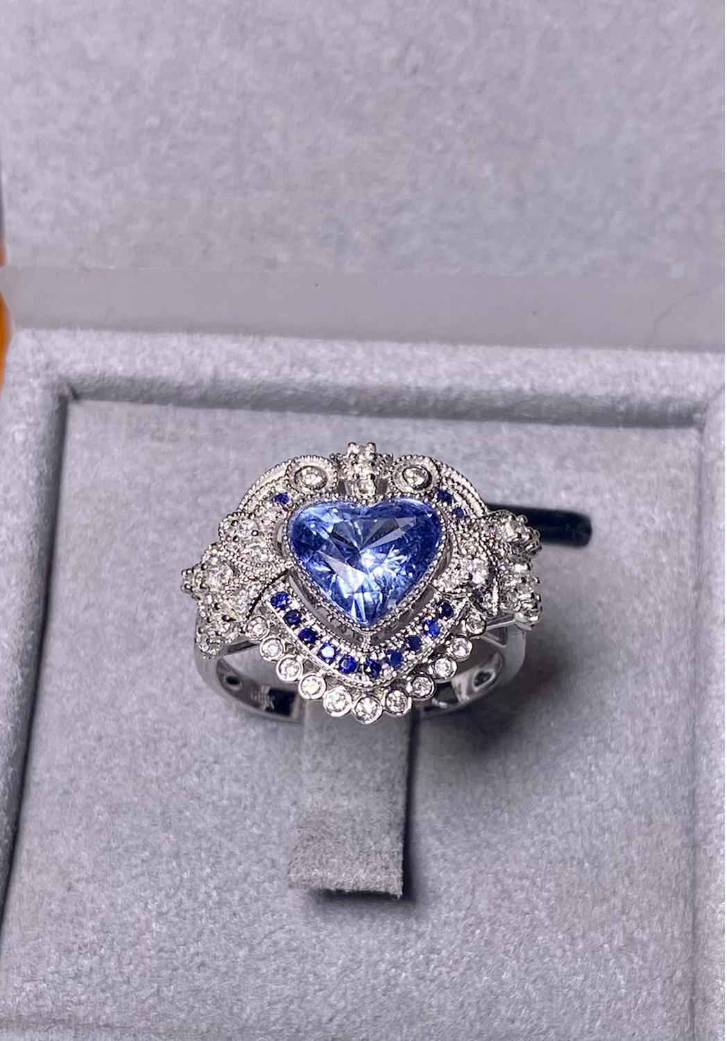 2.49ct Sapphire and Diamond Ring in 18k White Gold

Main Sapphire weight is 2.49ct
Total Natural Diamond weight is 

US Ring size is 7, The Inner Diameter of the Ring is 17.32mm
