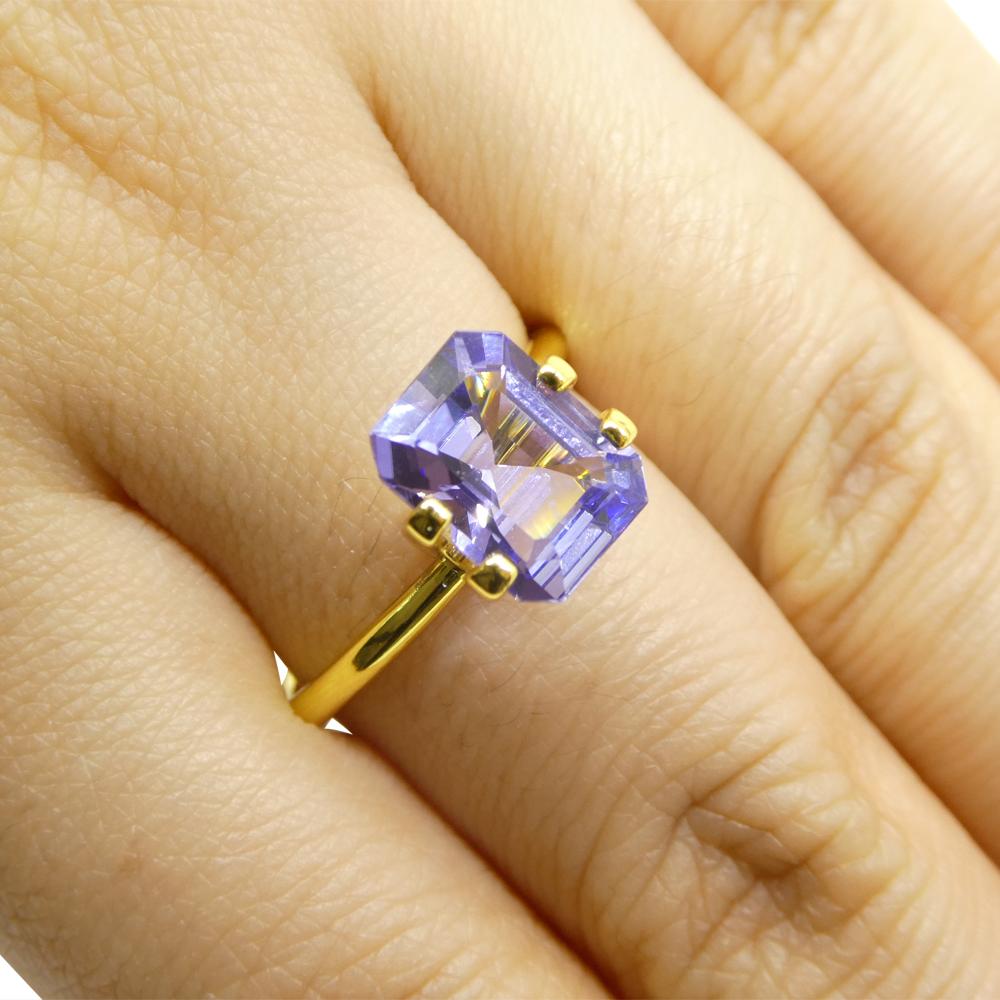 Description:

Gem Type: Tanzanite
Number of Stones: 1
Weight: 2.4 cts
Measurements: 9.38 x 7.24 x 4.63 mm
Shape: Emerald Cut
Cutting Style Crown: Step Cut
Cutting Style Pavilion: Step Cut
Transparency: Transparent
Clarity: Very Slightly Included: