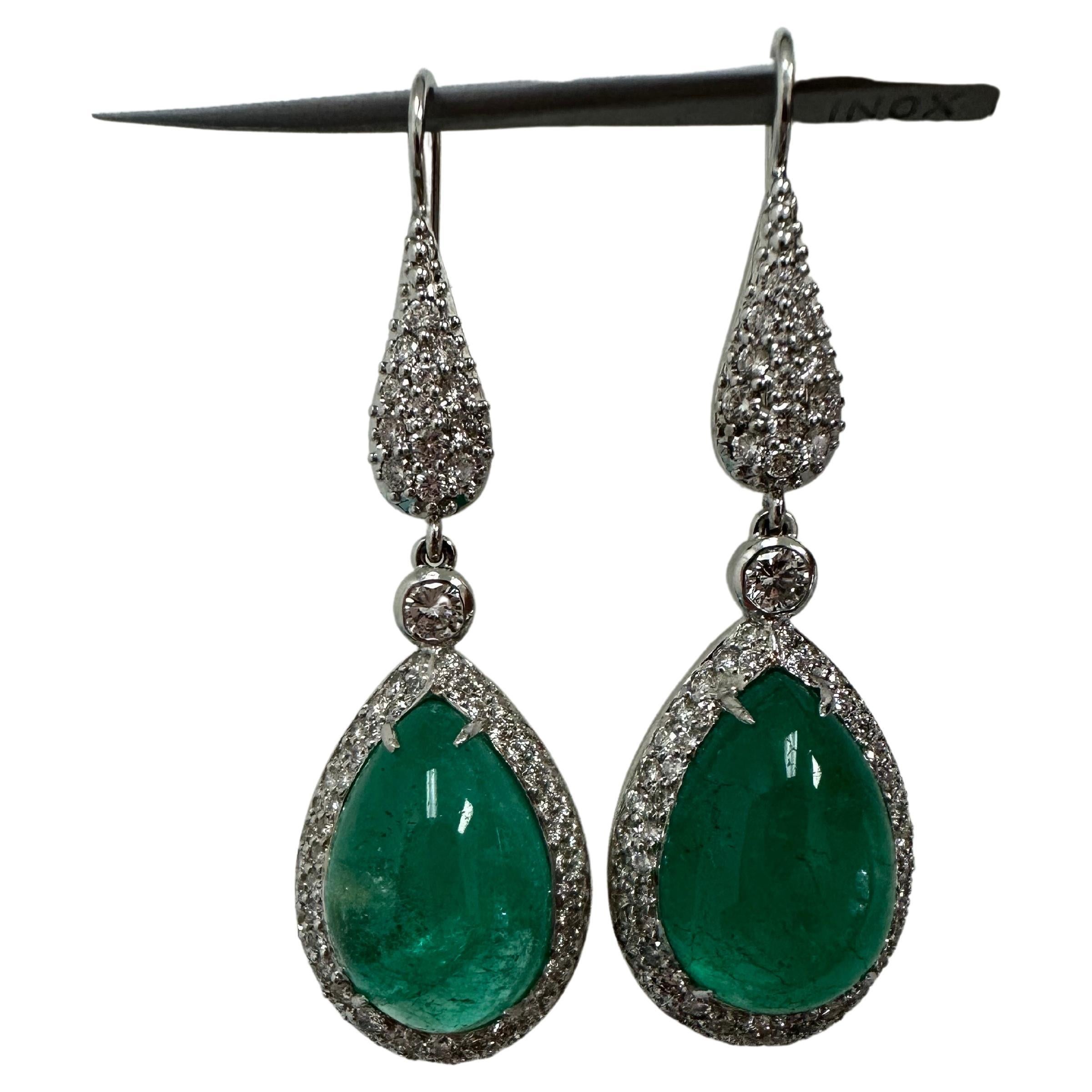 Important emerald and diamond earrings in 18KT gold. Exquisite craftsmanship and rare matching emeralds 100% natural and unenhanced. 
The earrings are long and luxurious made with a comfortable fish hook long for extra security and comfort, the
