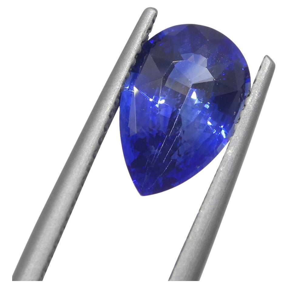 This is a stunning GIA Certified Sapphire 

The GIA report reads as follows:

GIA Report Number: 2215961036
Shape: Pear
Cutting Style: 
Cutting Style: Crown: Modified Brilliant Cut
Cutting Style: Pavilion: Step Cut
Transparency: Transparent
Color: