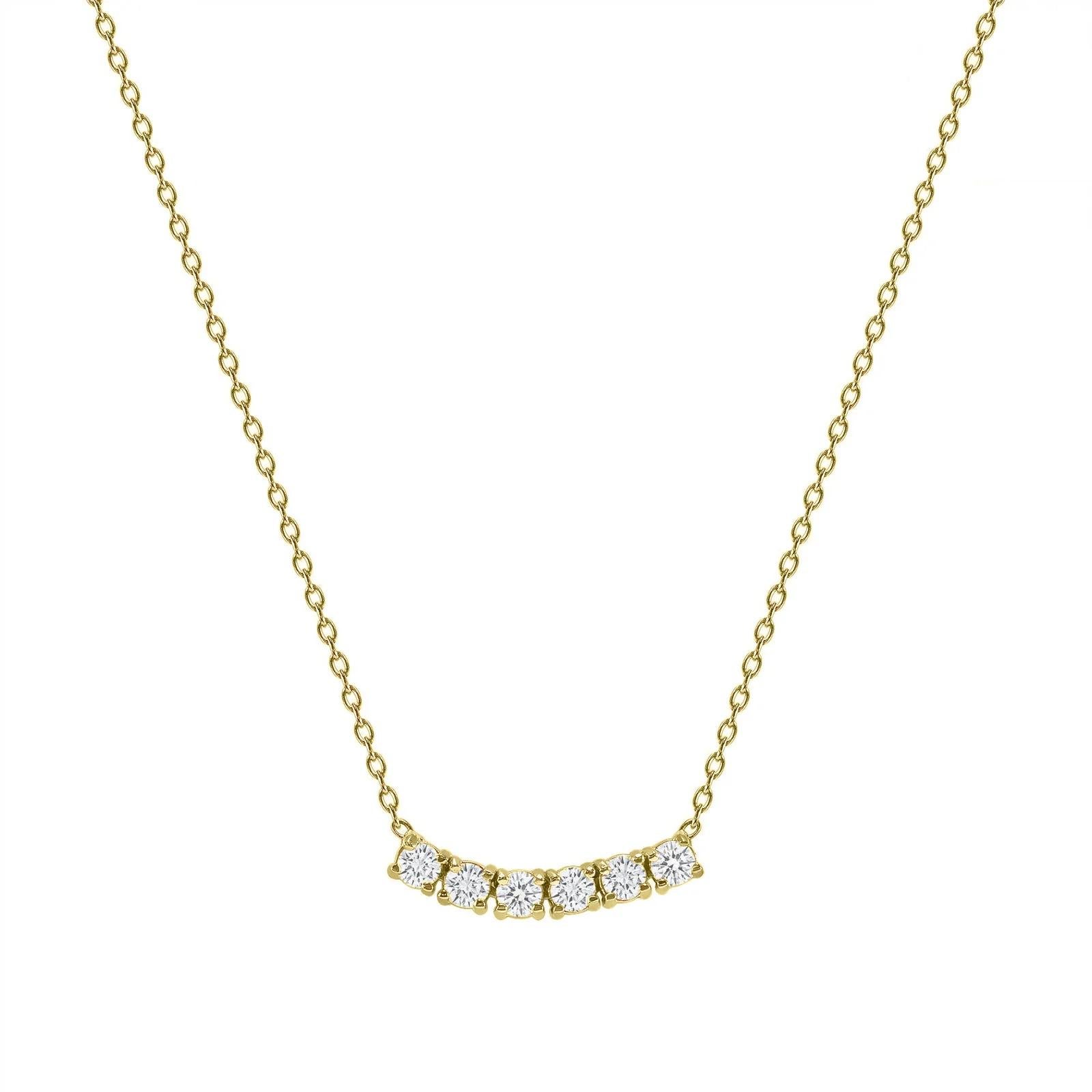 Questa piccola collana di diamanti ricurva è realizzata in splendido oro 14k con sei diamanti rotondi incastonati.  

Oro: 14k 
Carati totali del diamante: 0,75 ct
Taglio del diamante: Rotondo (6 diamanti)
Chiarezza del diamante: VS
Colore del