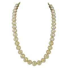 24K gold and uncut diamonds polki inlaid south sea pearls from India