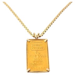 Barretta d'oro 24k vintage con castone 22k su una collana d'oro giallo 14k