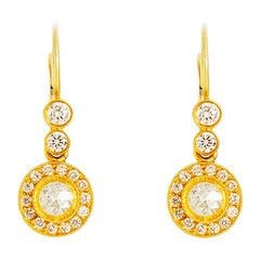 Boucles d'oreilles solitaires en or 24 carats taillées à la main en rose